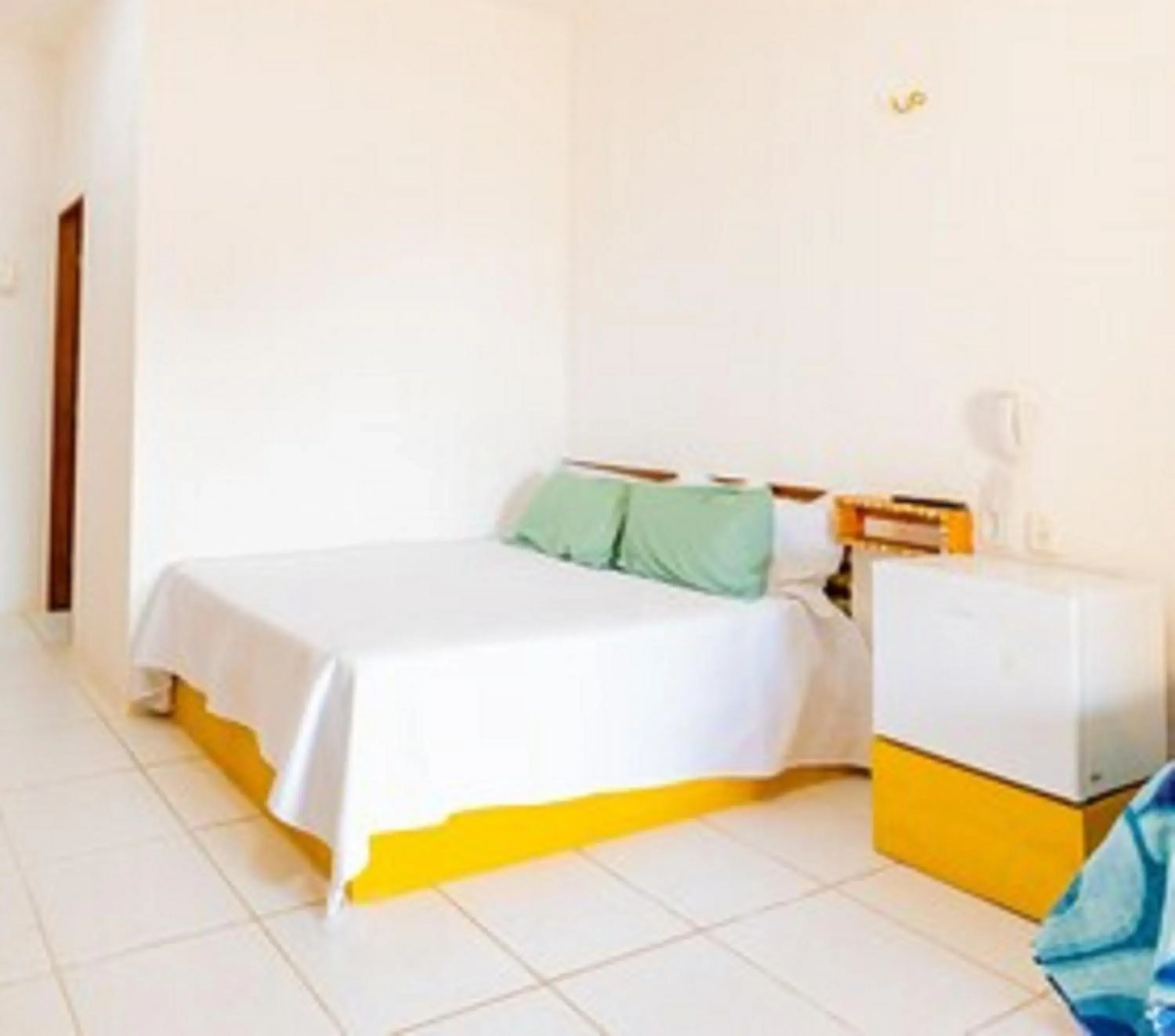Double Room without AC in OYO Hotel Das Pedras Double Room without AC in OYO Hotel Das Pedras