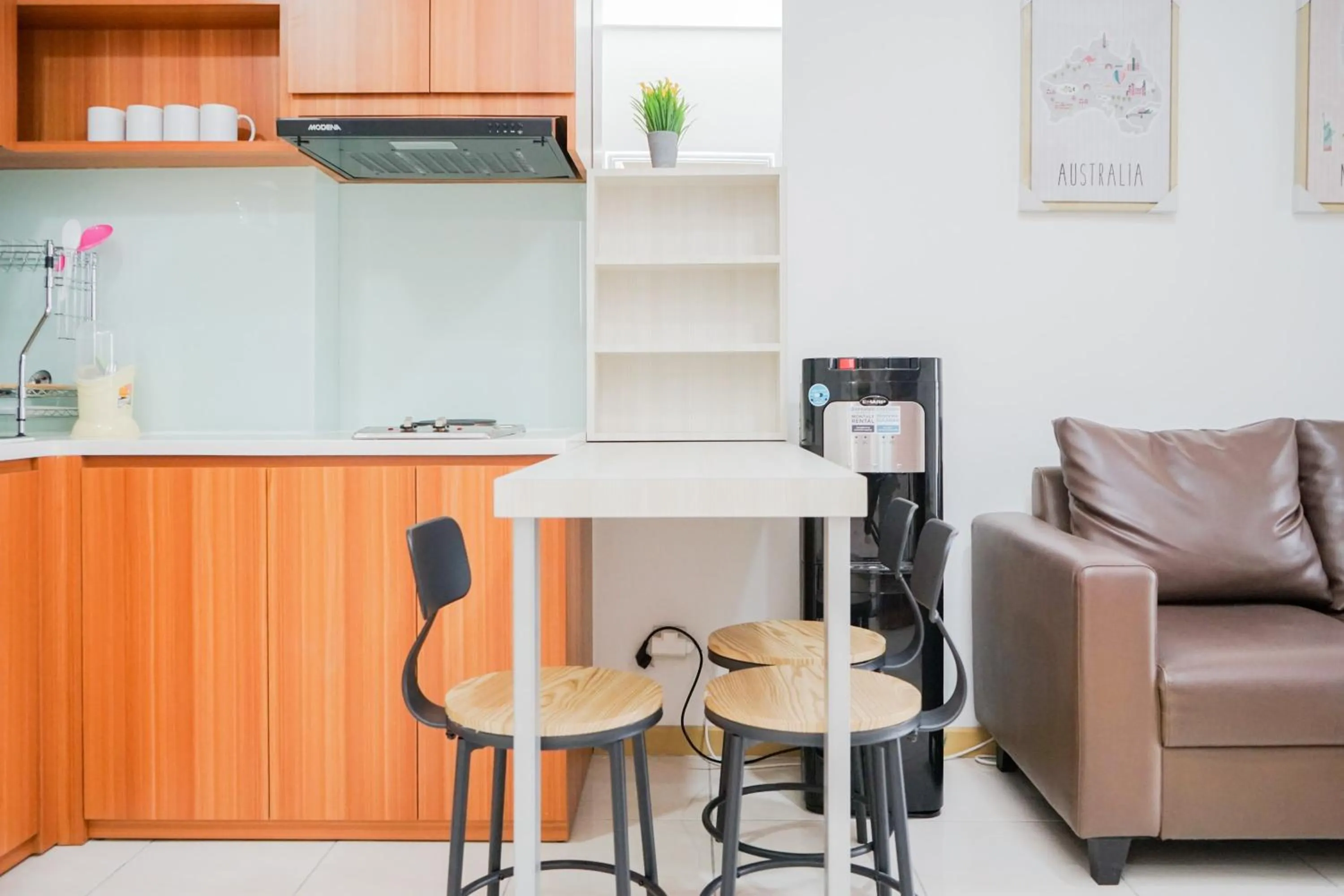 Dining area in Great Choice 2BR Apartment at M-Town Residence By Travelio