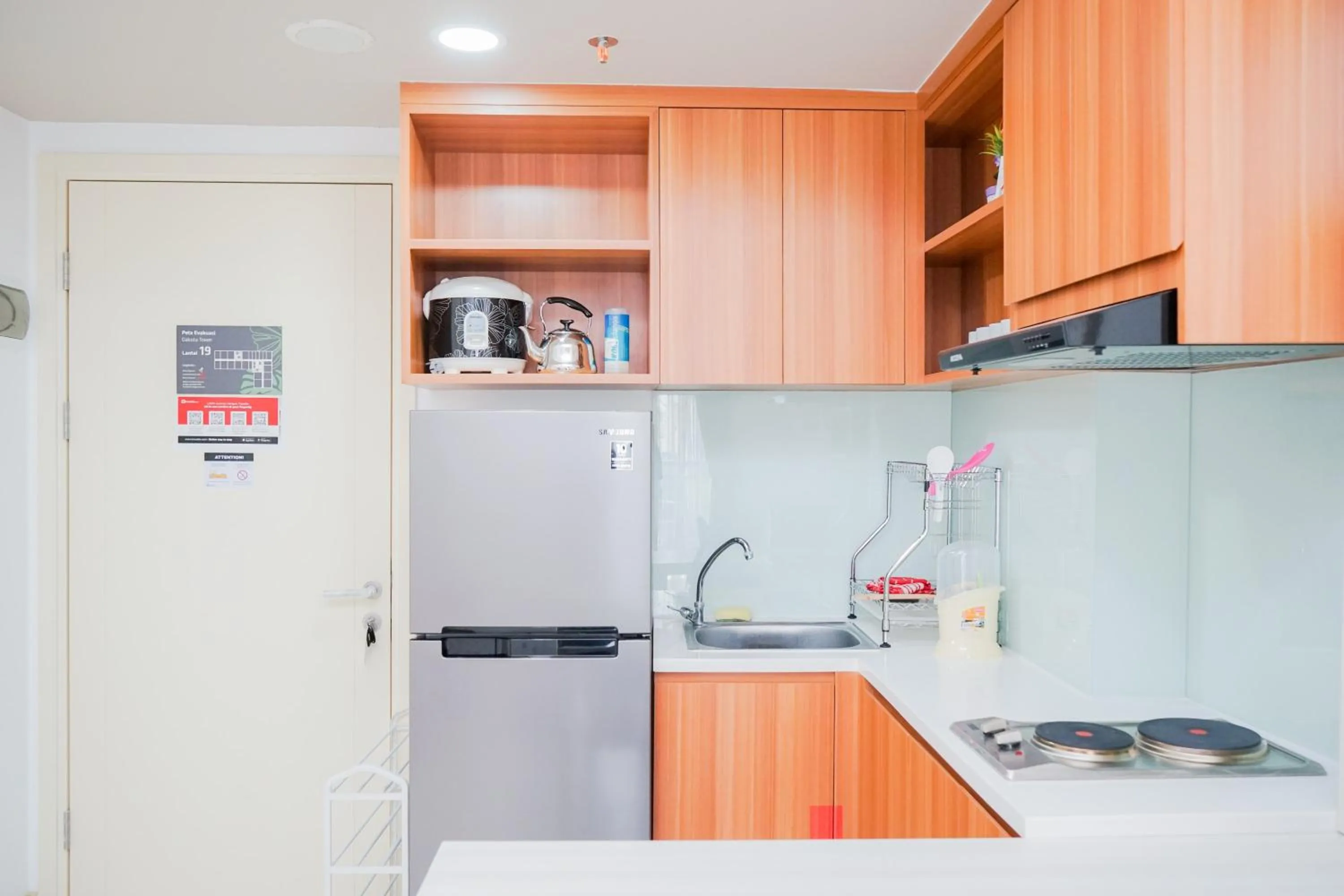 Kitchen or kitchenette in Great Choice 2BR Apartment at M-Town Residence By Travelio