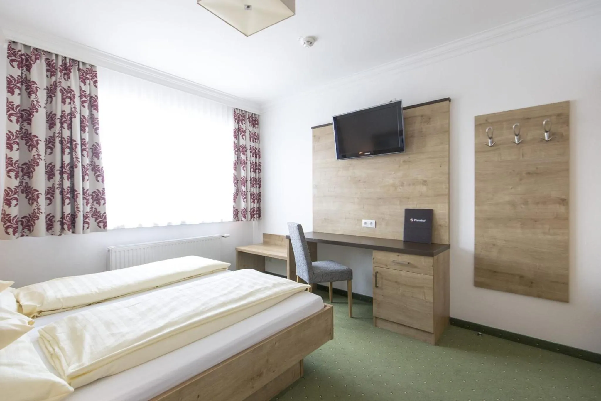 Photo of the whole room, Bed in Hotel-Restaurant Planaihof