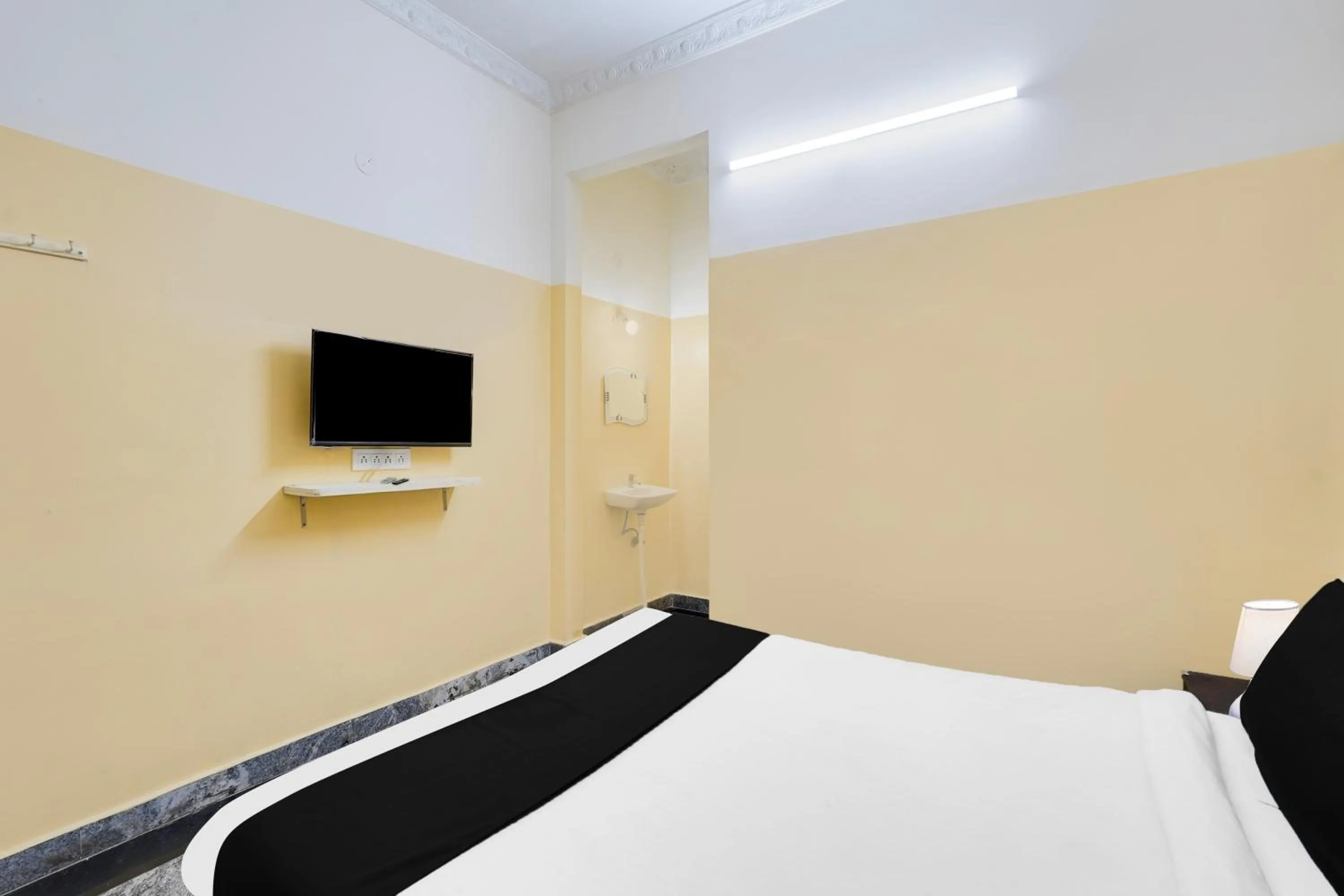 Bedroom, Bed in Super Hotel O Karakambadi Road Near Leela Mahal Circle