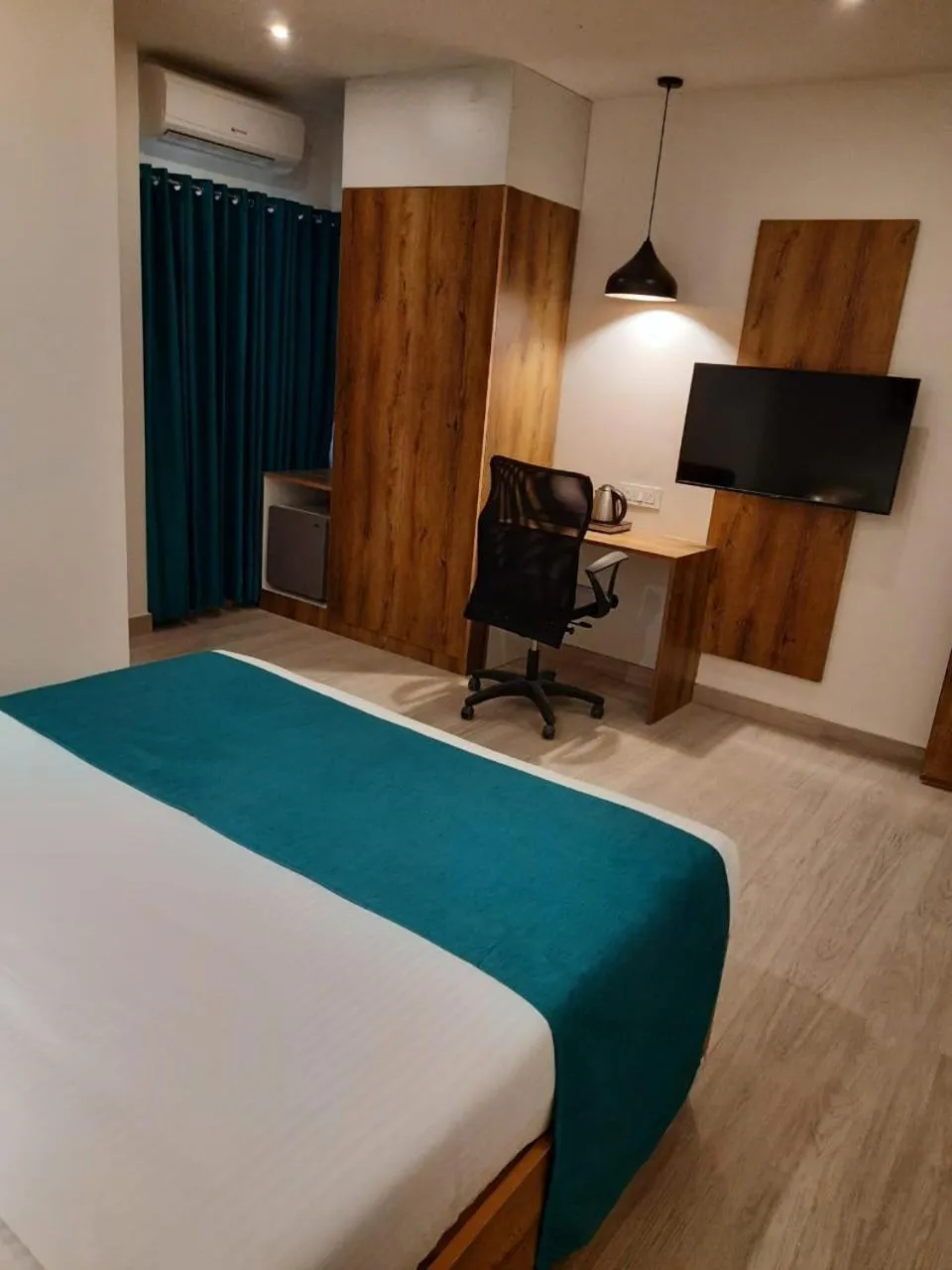 Bed in Regenta INN Grand Koramangala by Royal Orchid Hotels