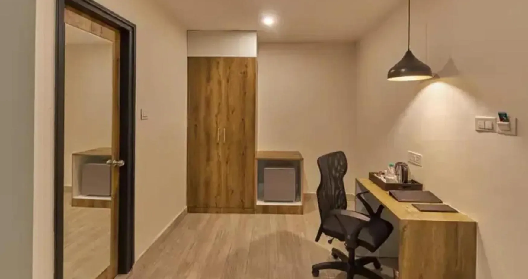 Seating area in Regenta INN Grand Koramangala by Royal Orchid Hotels