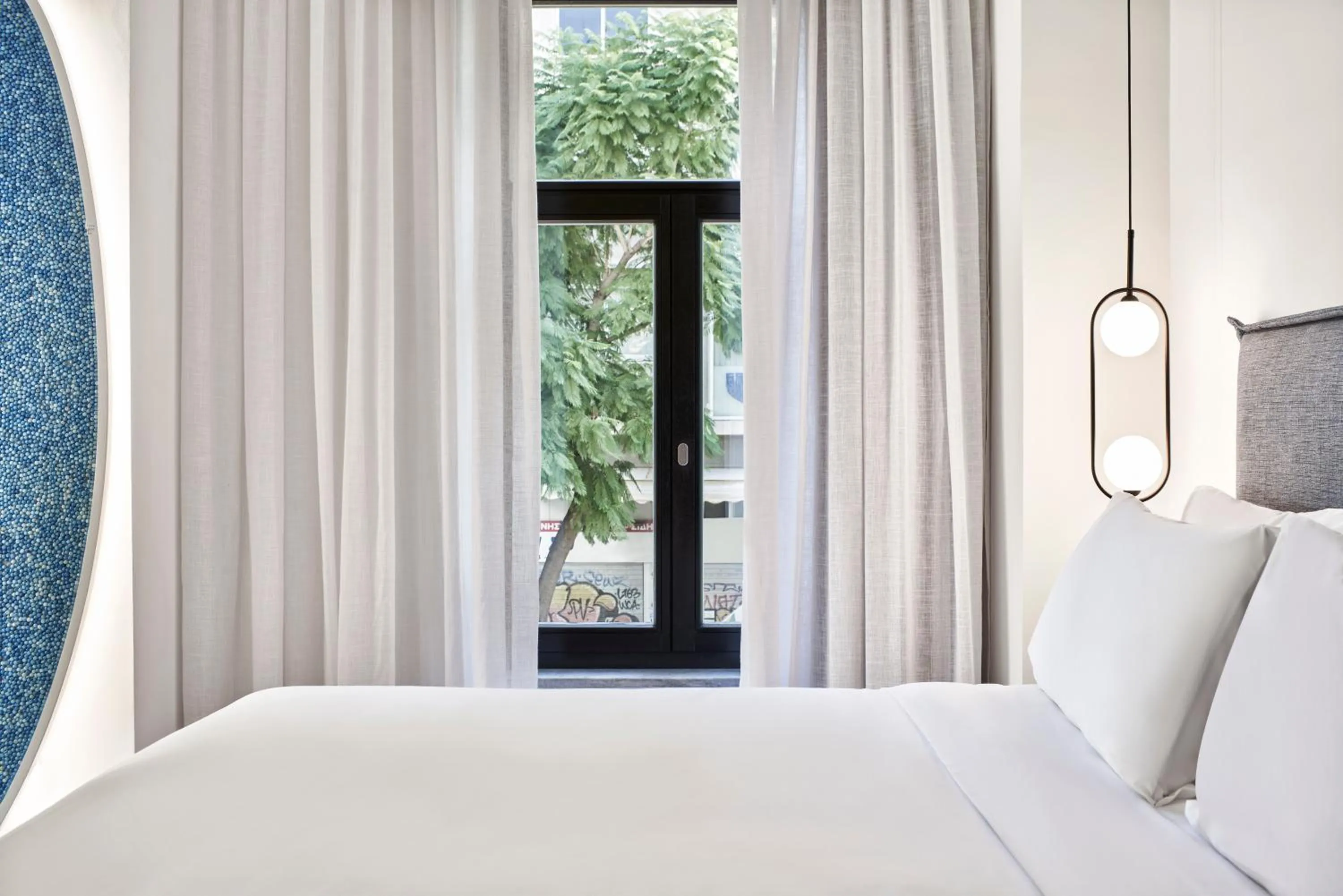 Bed in NLH MONASTIRAKI - Neighborhood Lifestyle Hotels