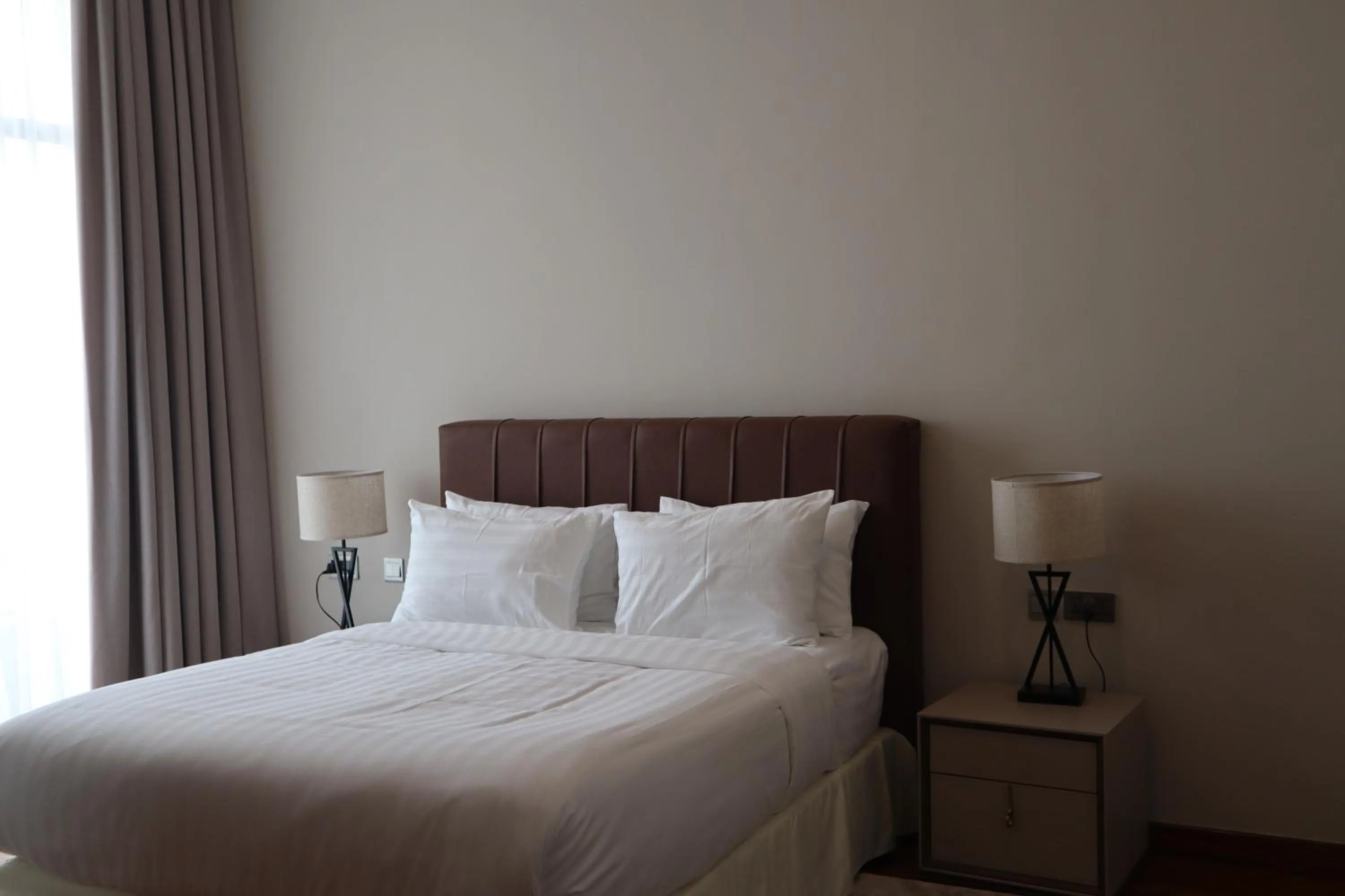 Bed in The Curve by the Park Apartments