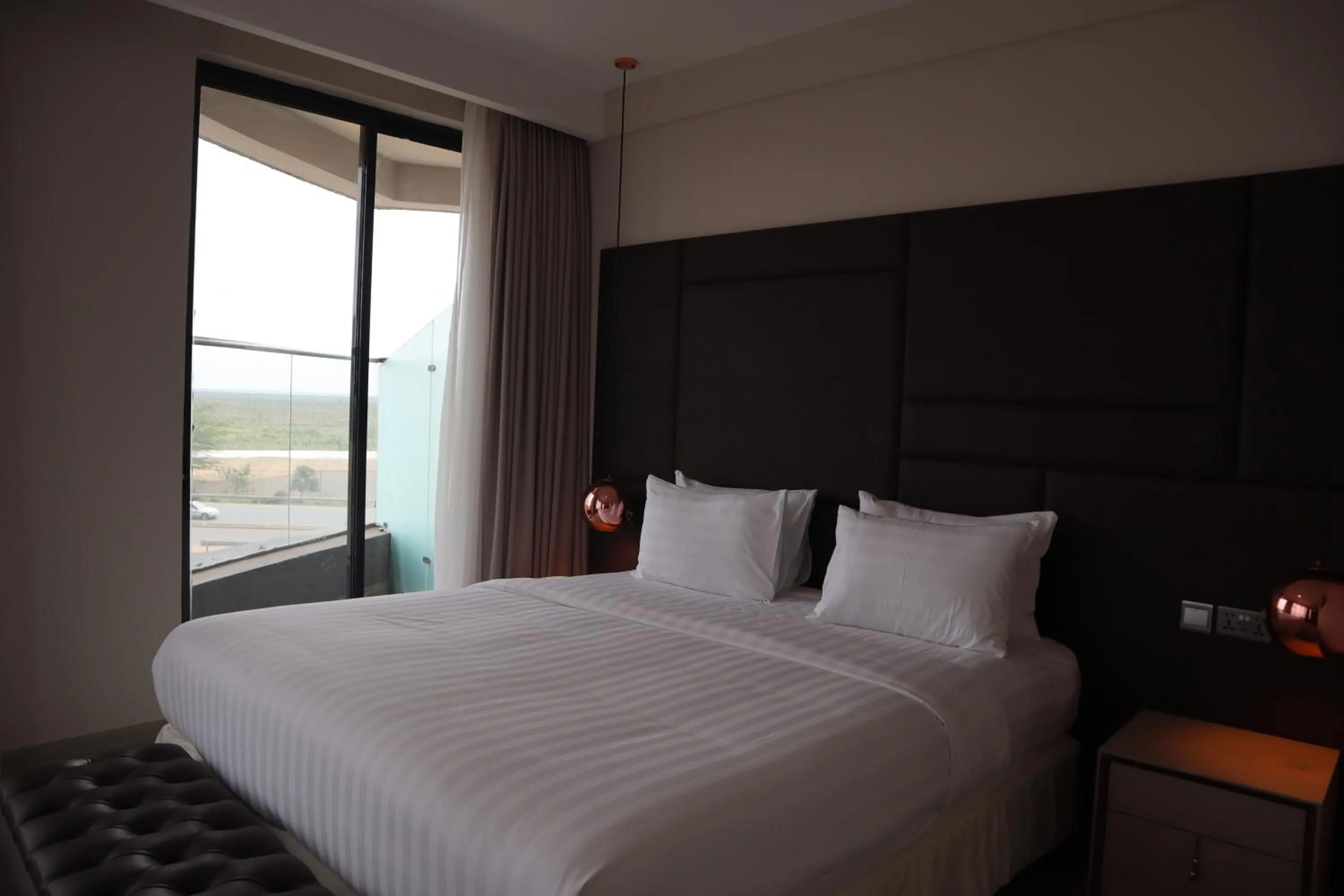 Bed in The Curve by the Park Apartments