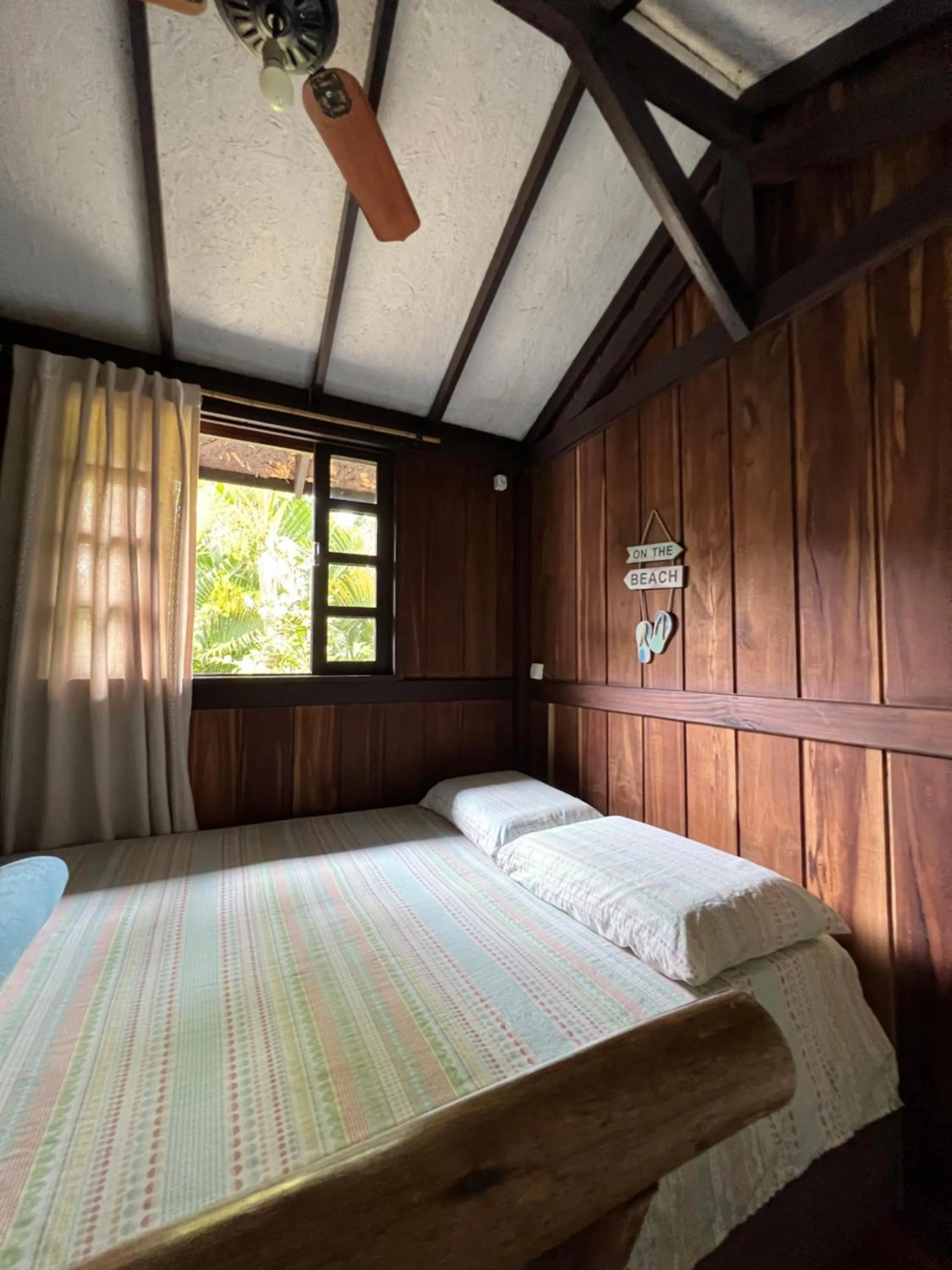 Bed in Pousada Vila Piola