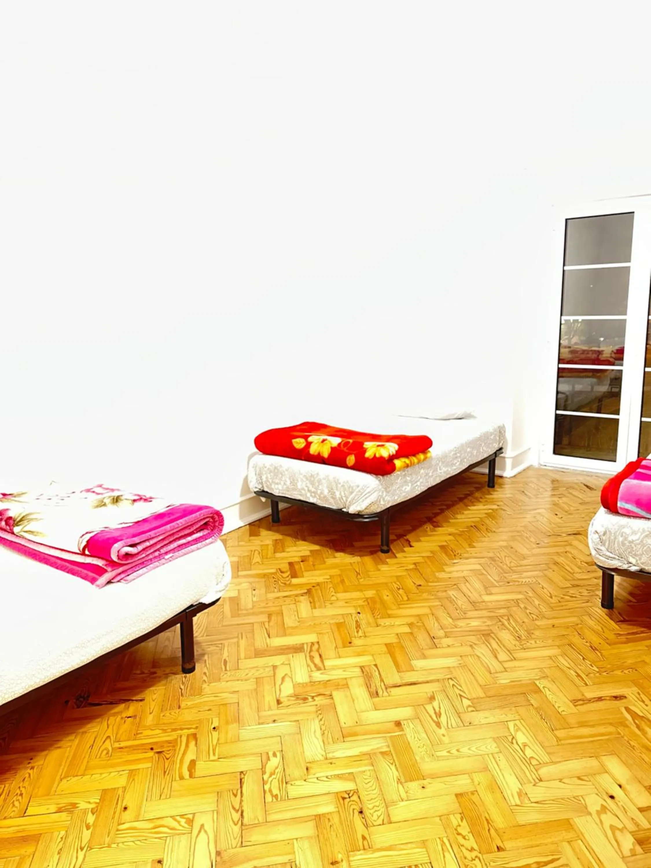 Bed in Rainbow Guest House