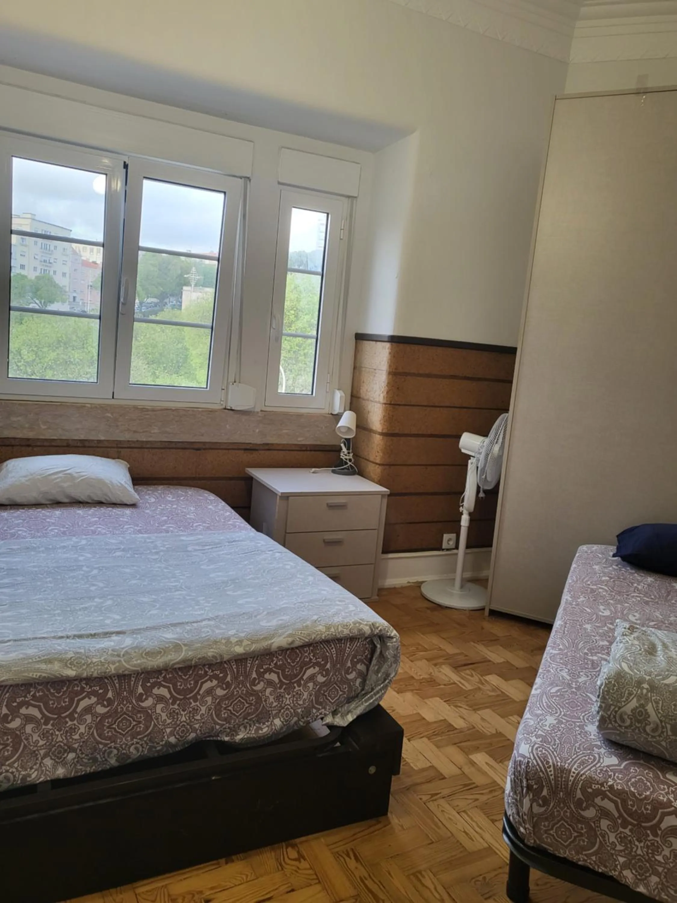 Bed in Rainbow Guest House