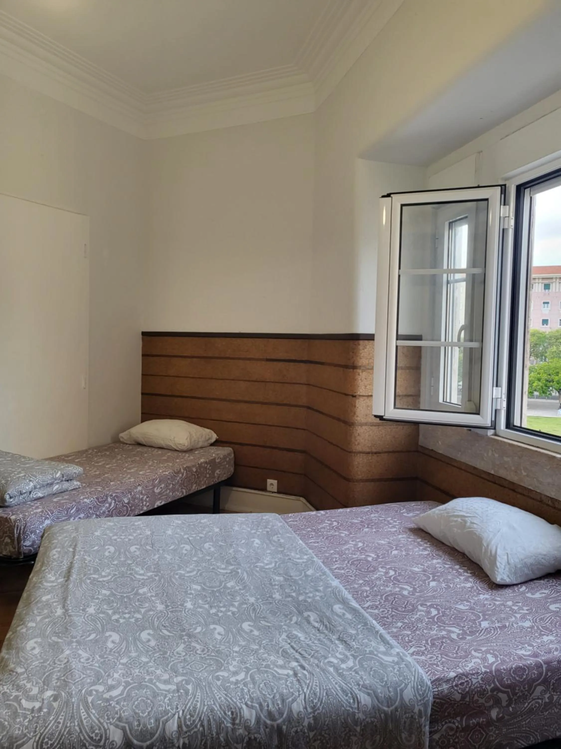 Bed in Rainbow Guest House