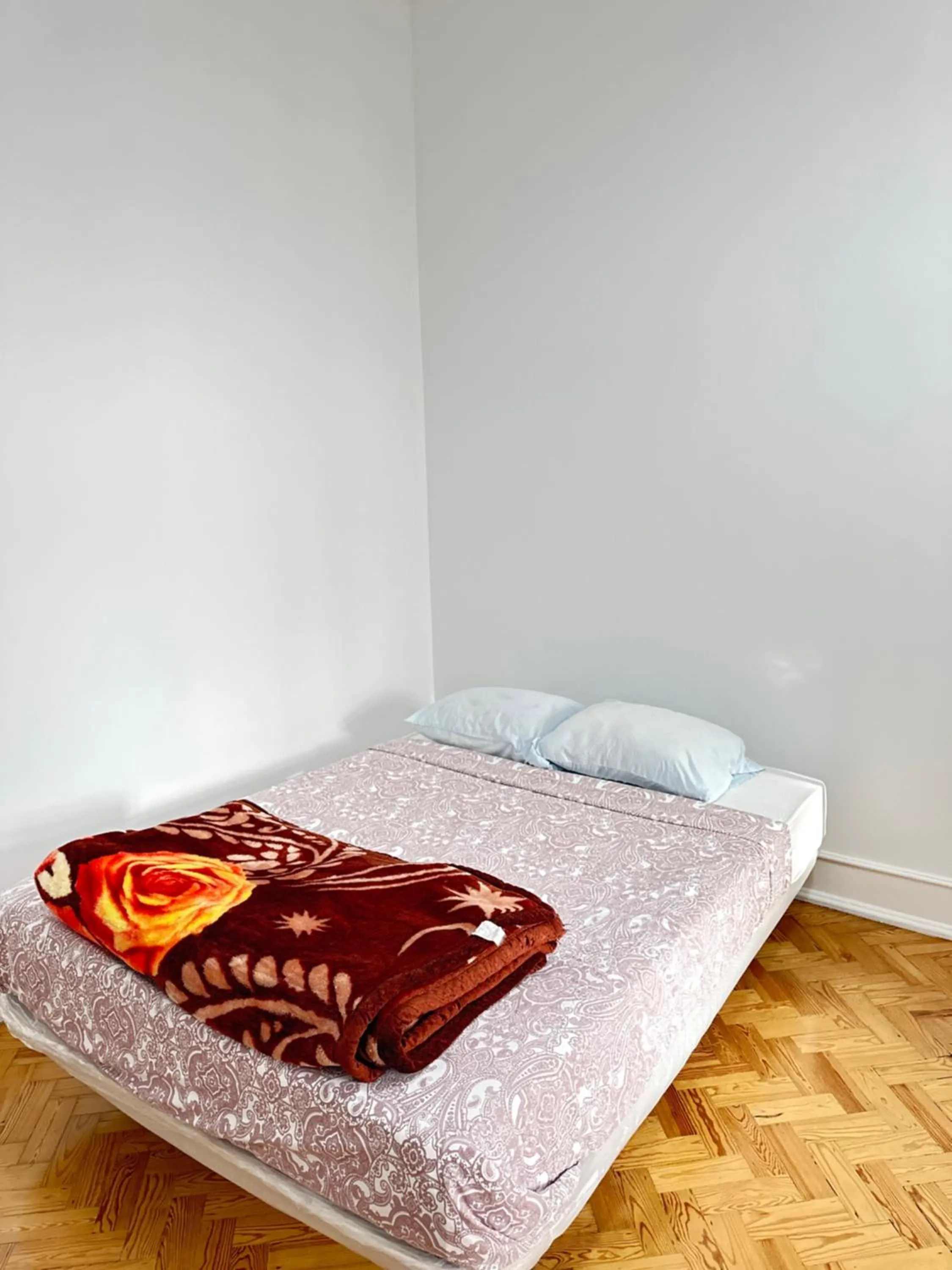 Bed in Rainbow Guest House