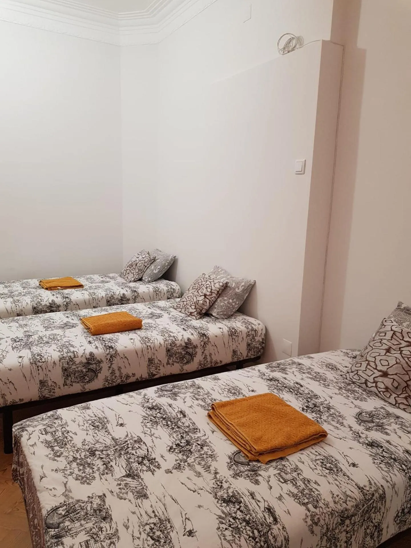 Bed in Rainbow Guest House