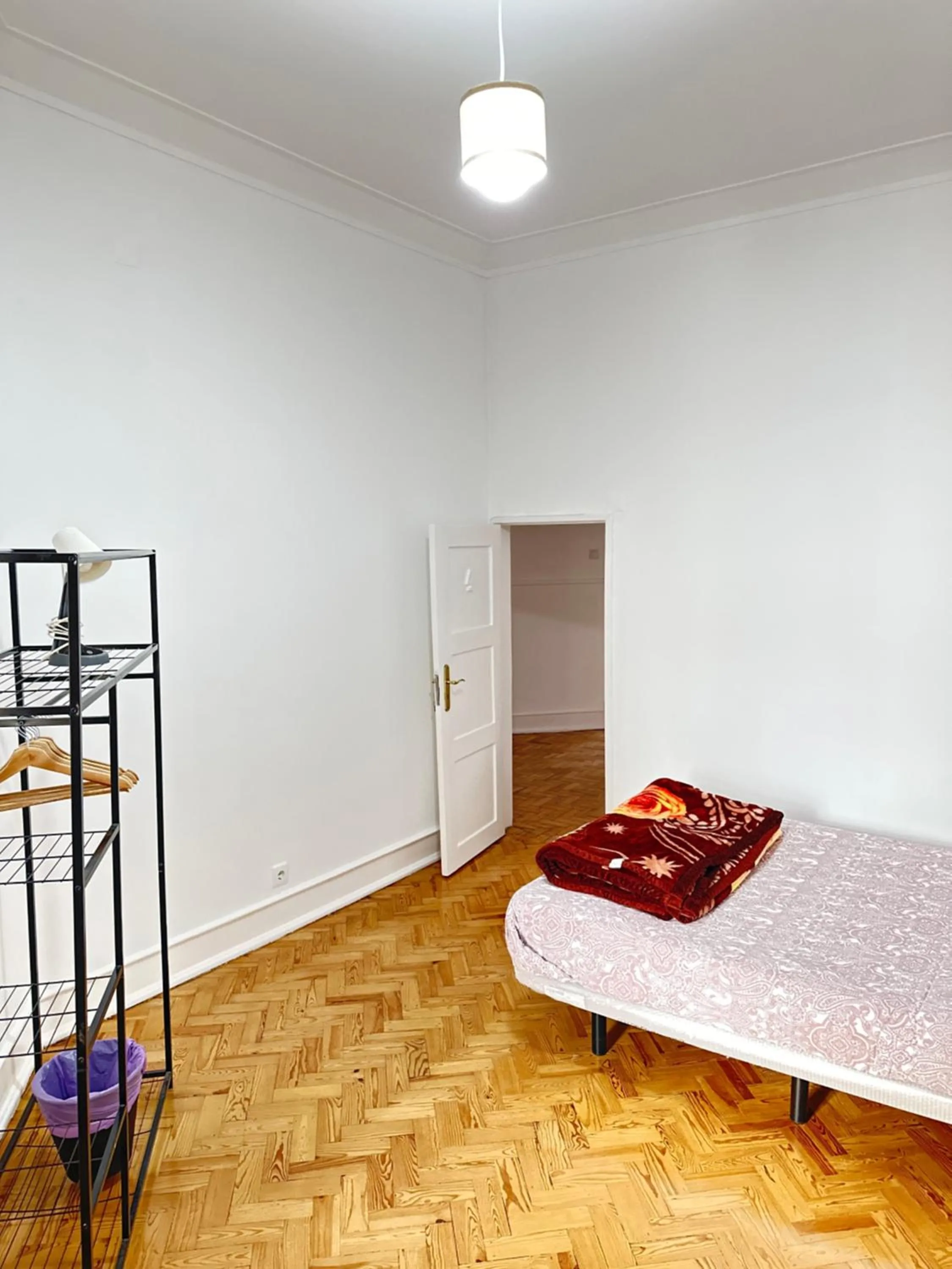 Bed in Rainbow Guest House