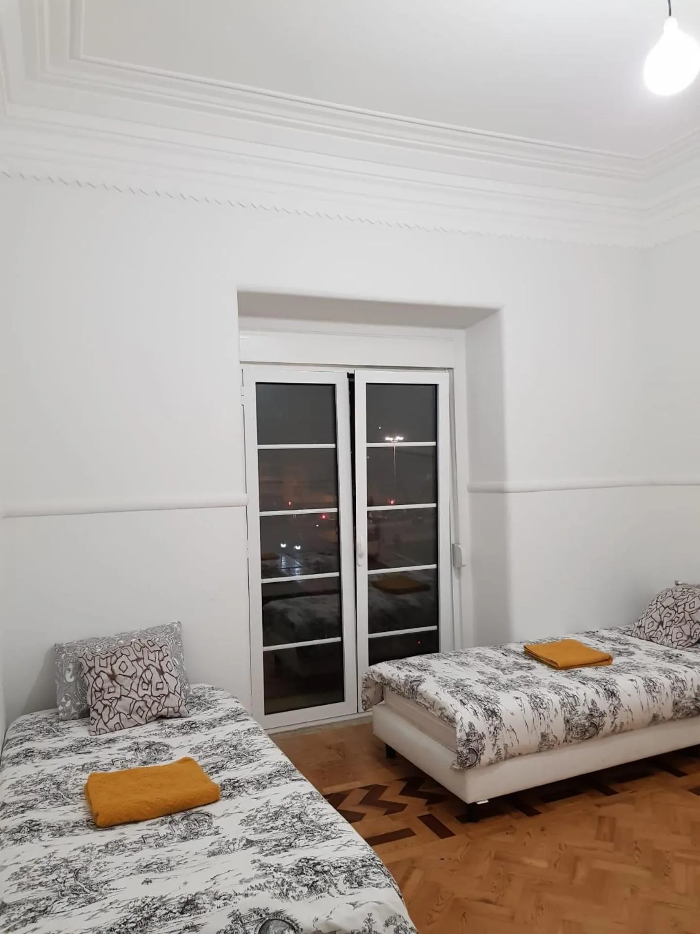 Bed in Rainbow Guest House