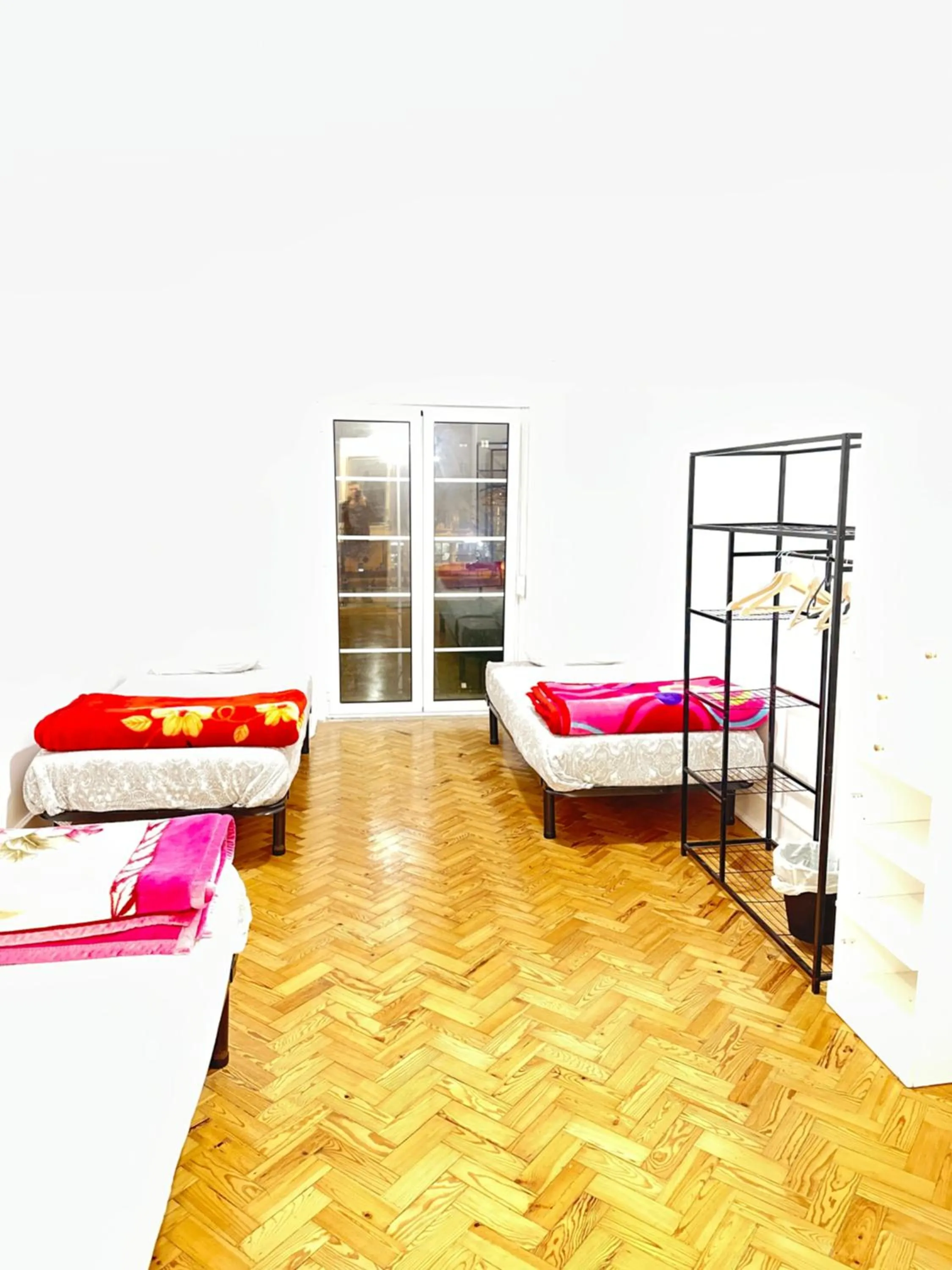 Bed in Rainbow Guest House