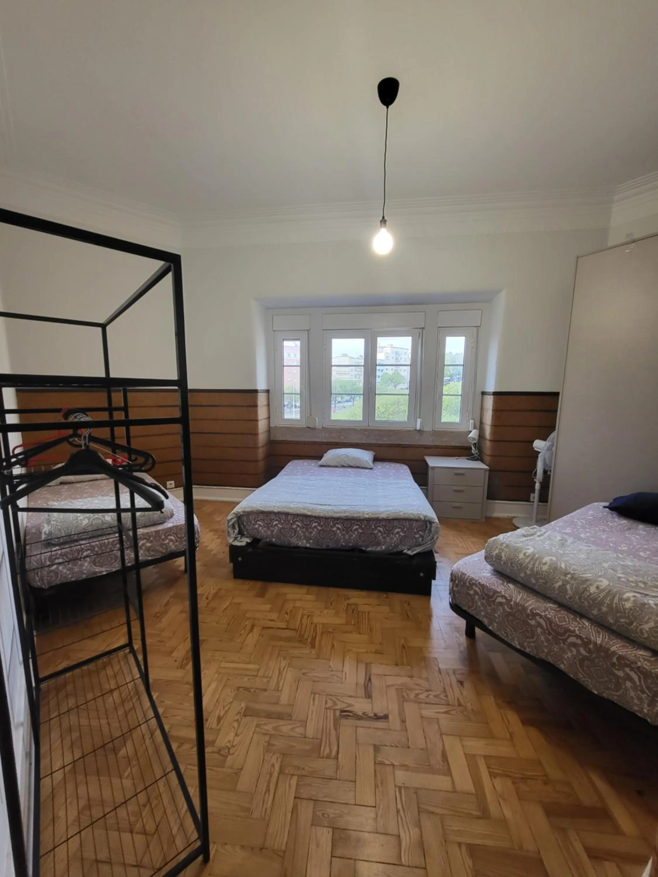 Bed in Rainbow Guest House