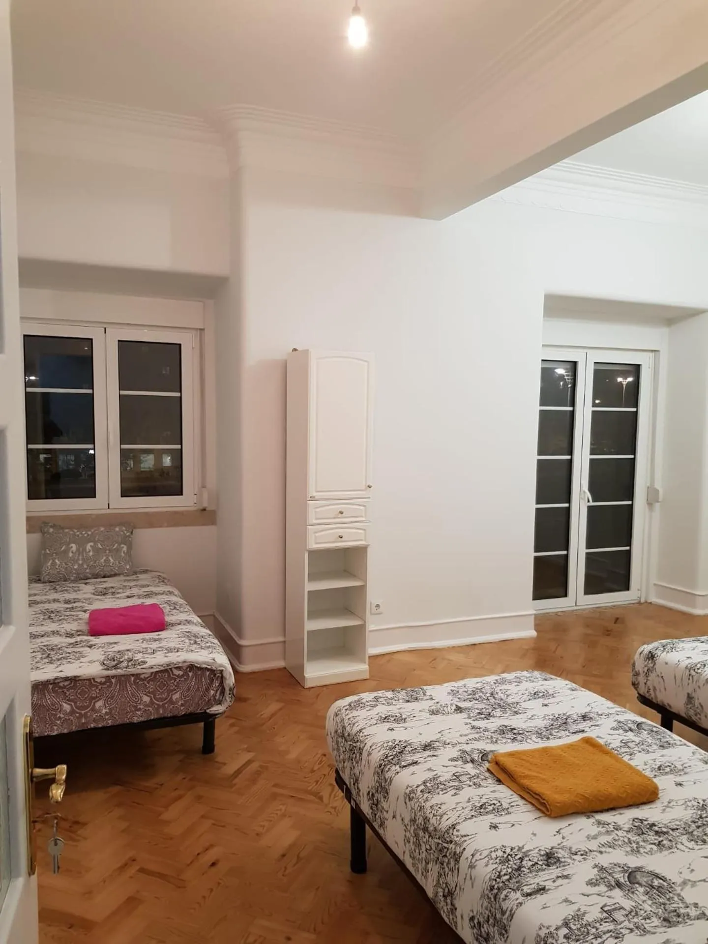 Bed in Rainbow Guest House