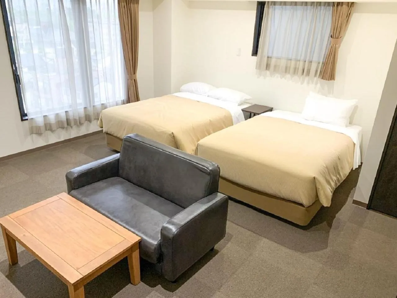 Bed in HOTEL LiVEMAX Kyoto Nijojonishi