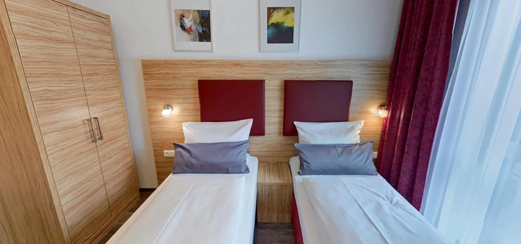 Photo of the whole room, Bed in SmartMotel Emden - by Quartier96 GmbH