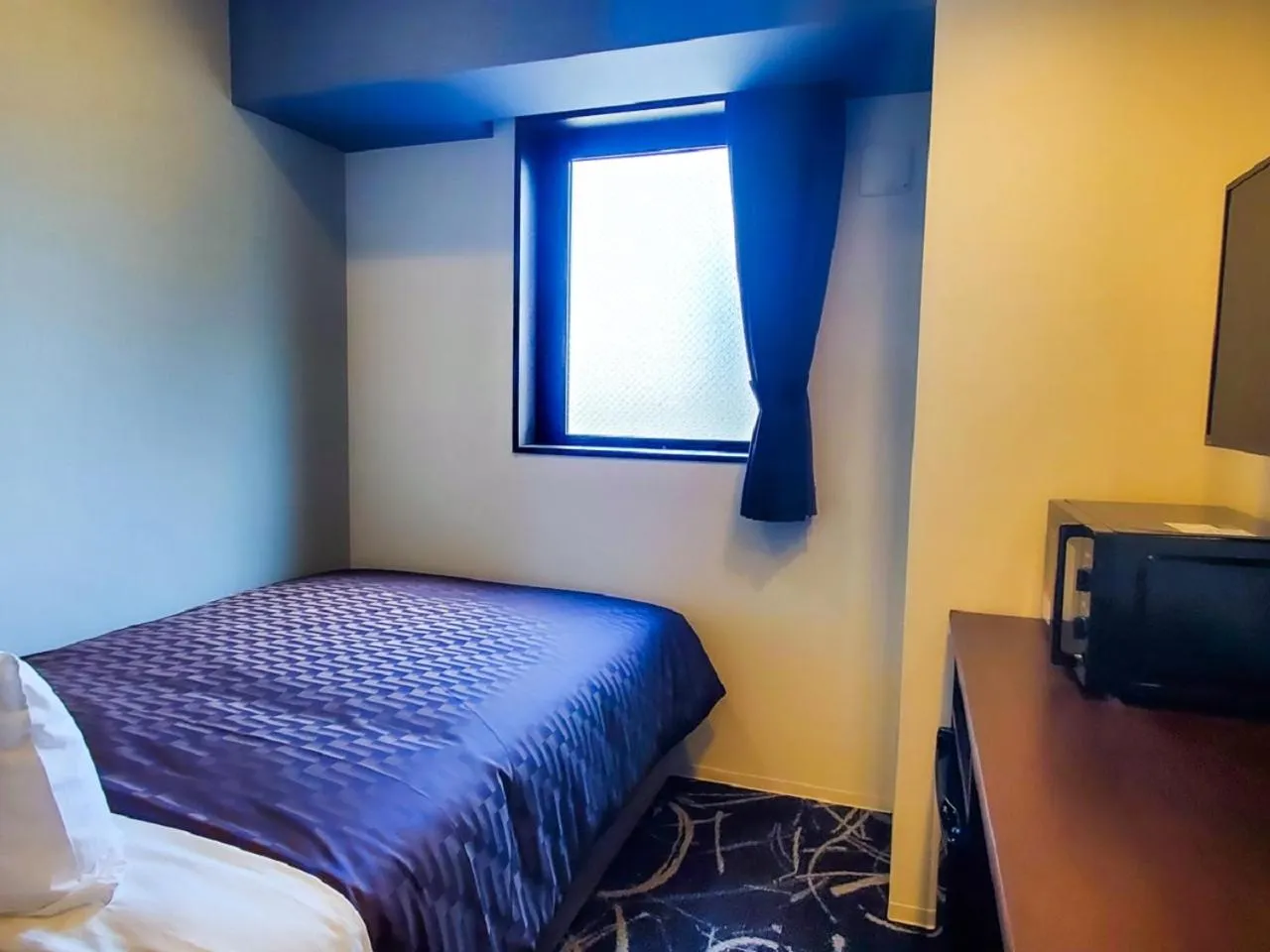 Bed in HOTEL LiVEMAX Yokohama Stadium Mae