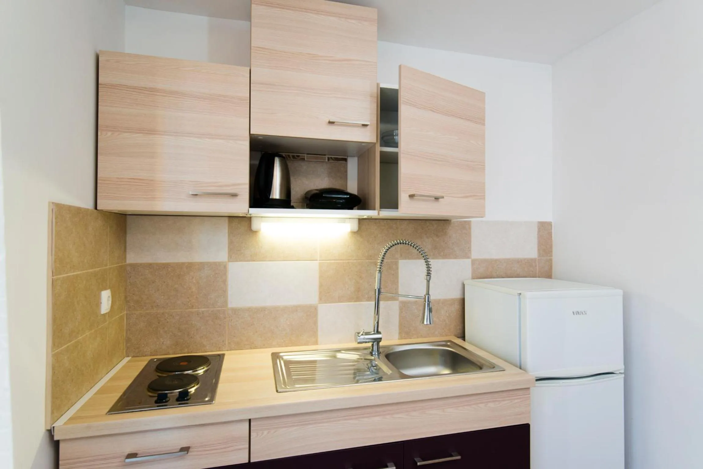 Kitchen or kitchenette in Apartments Villa Nona