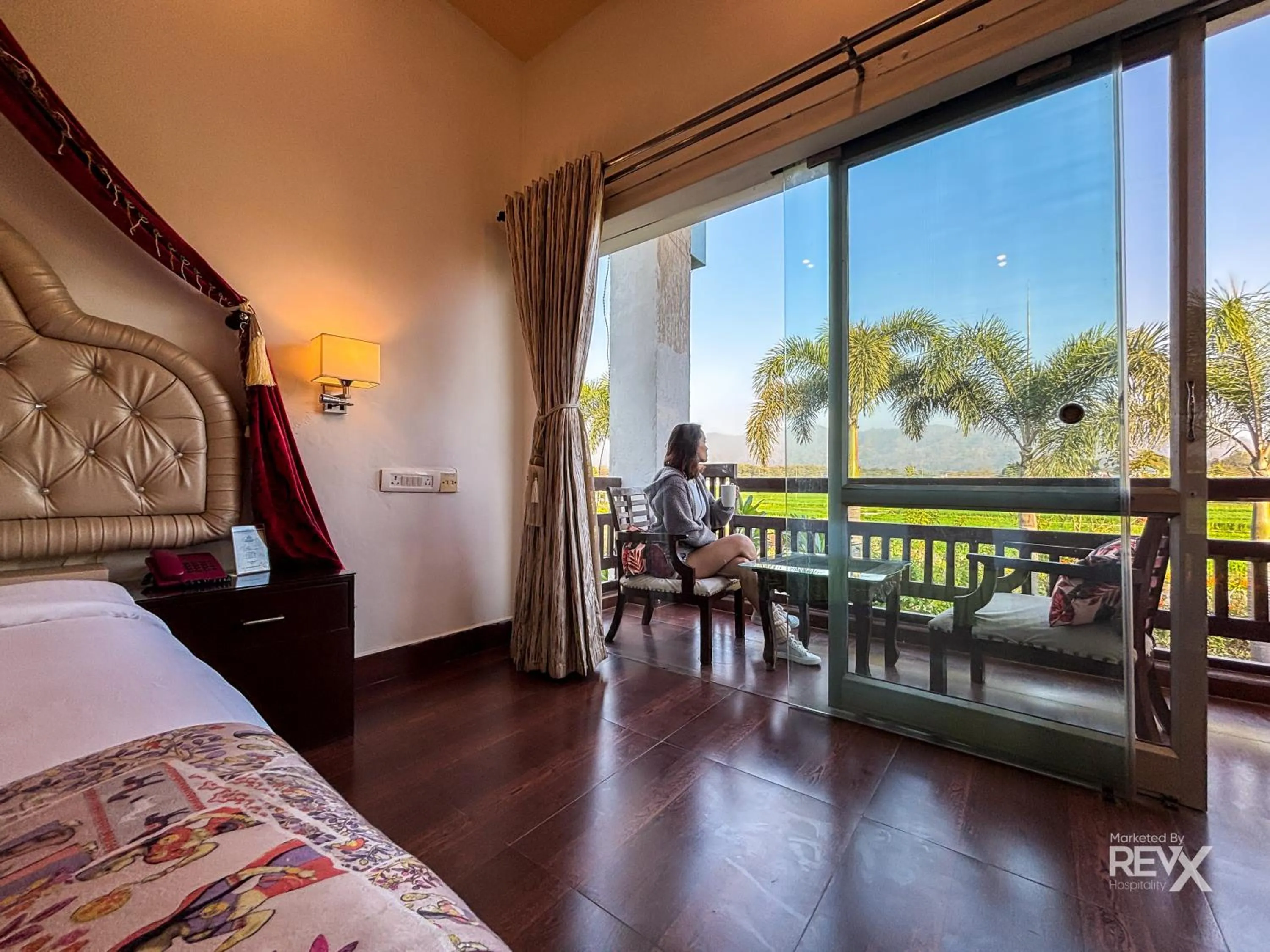 Bed in The Neeraj River Forest Resort Ayurvedic Wellness Center