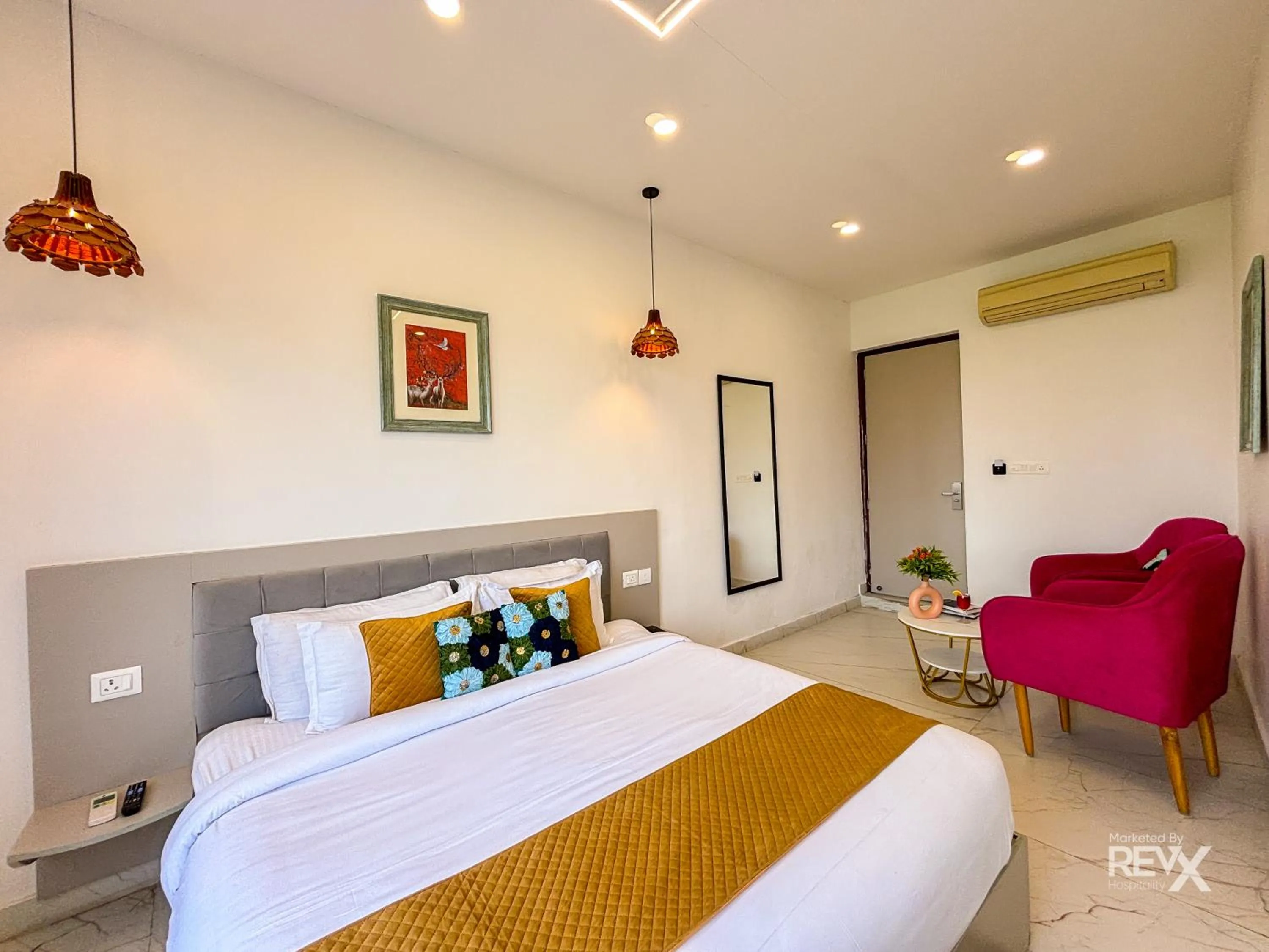 Bed in The Neeraj River Forest Resort Ayurvedic Wellness Center