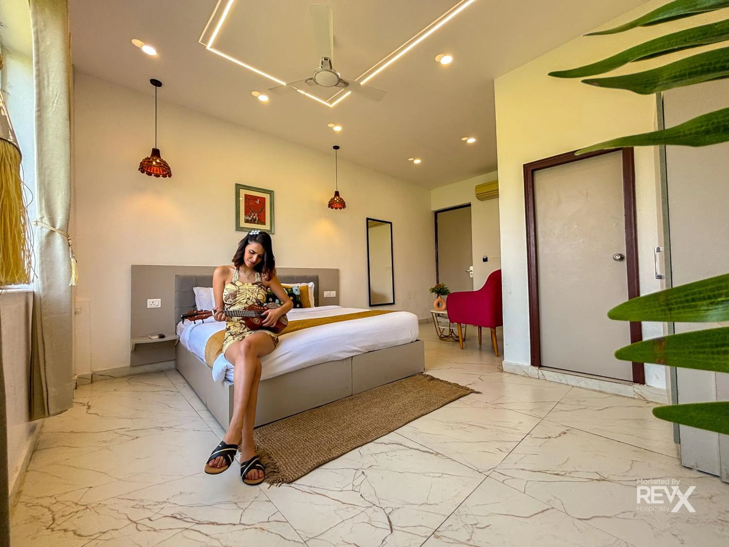 Bed in The Neeraj River Forest Resort Ayurvedic Wellness Center