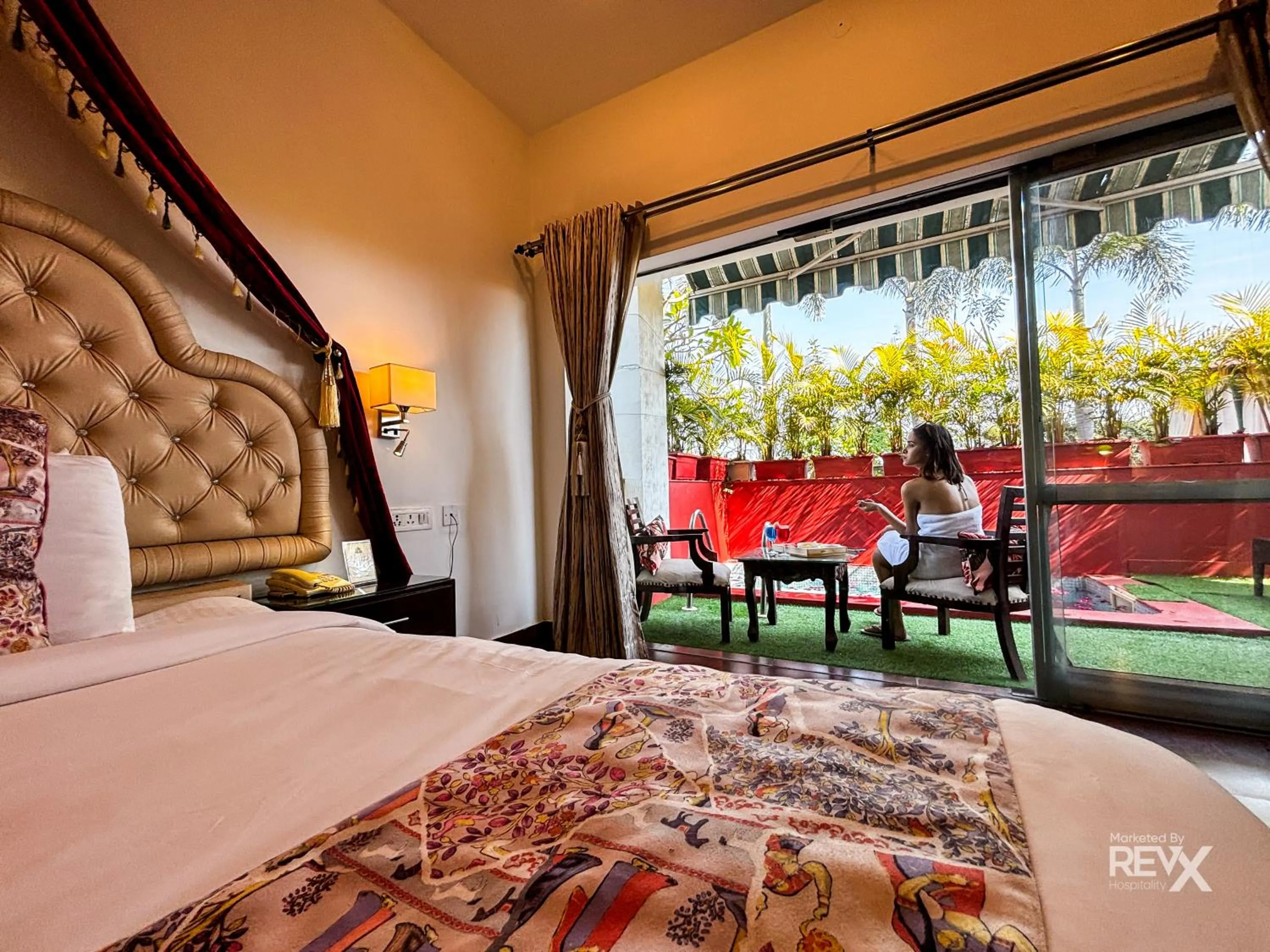 Bed in The Neeraj River Forest Resort Ayurvedic Wellness Center