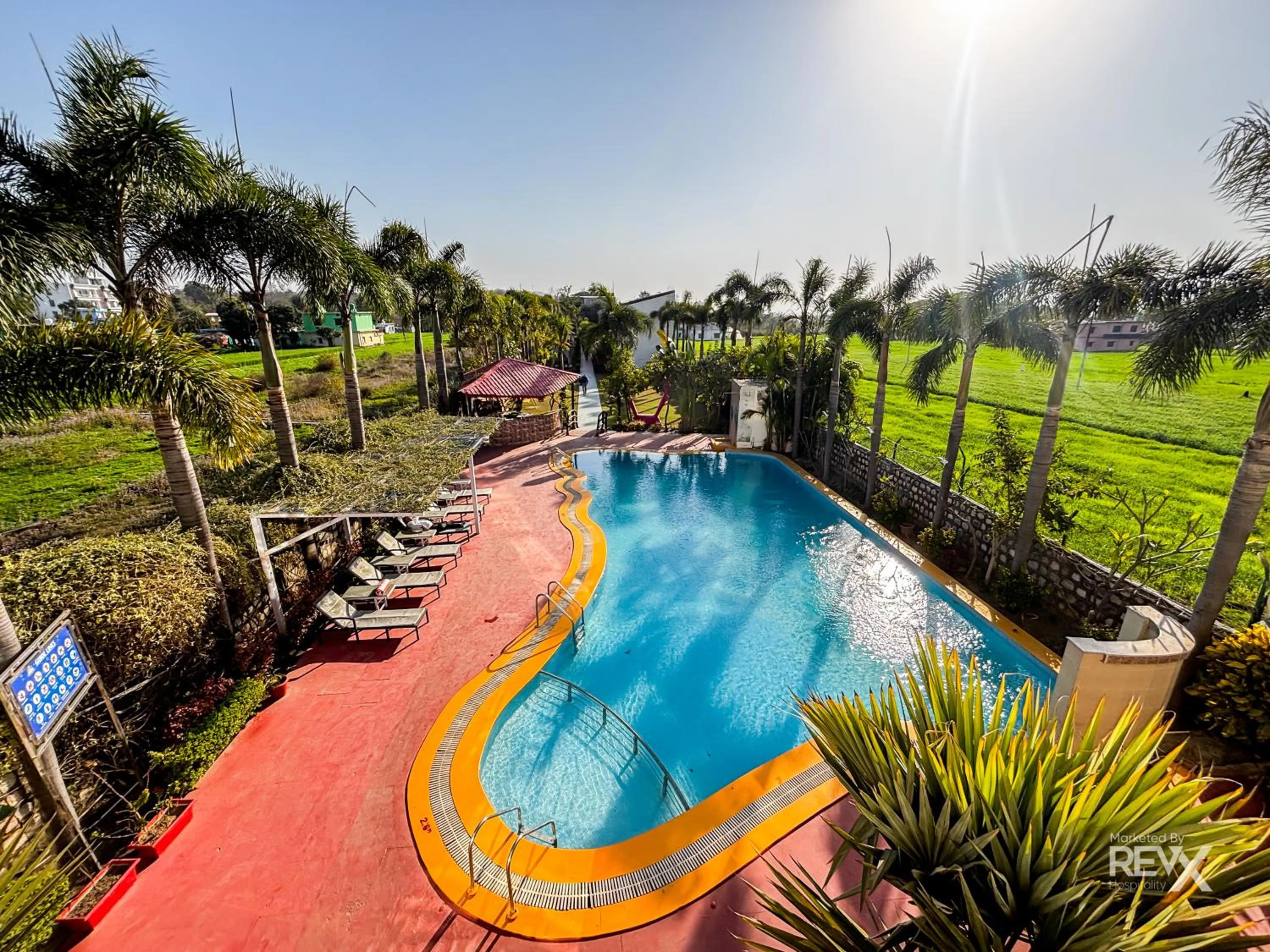 Swimming pool in The Neeraj River Forest Resort Ayurvedic Wellness Center