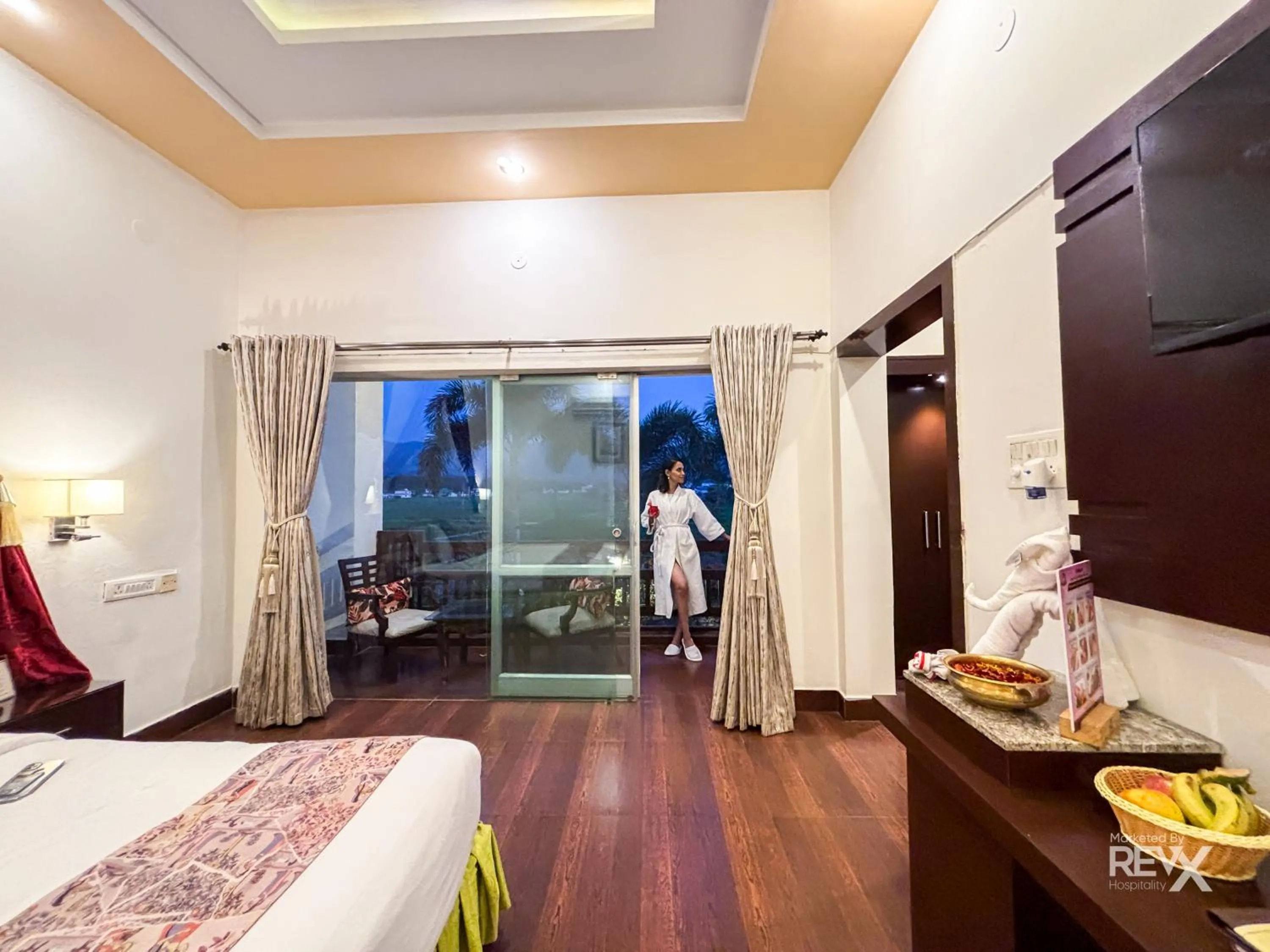 Bed in The Neeraj River Forest Resort Ayurvedic Wellness Center