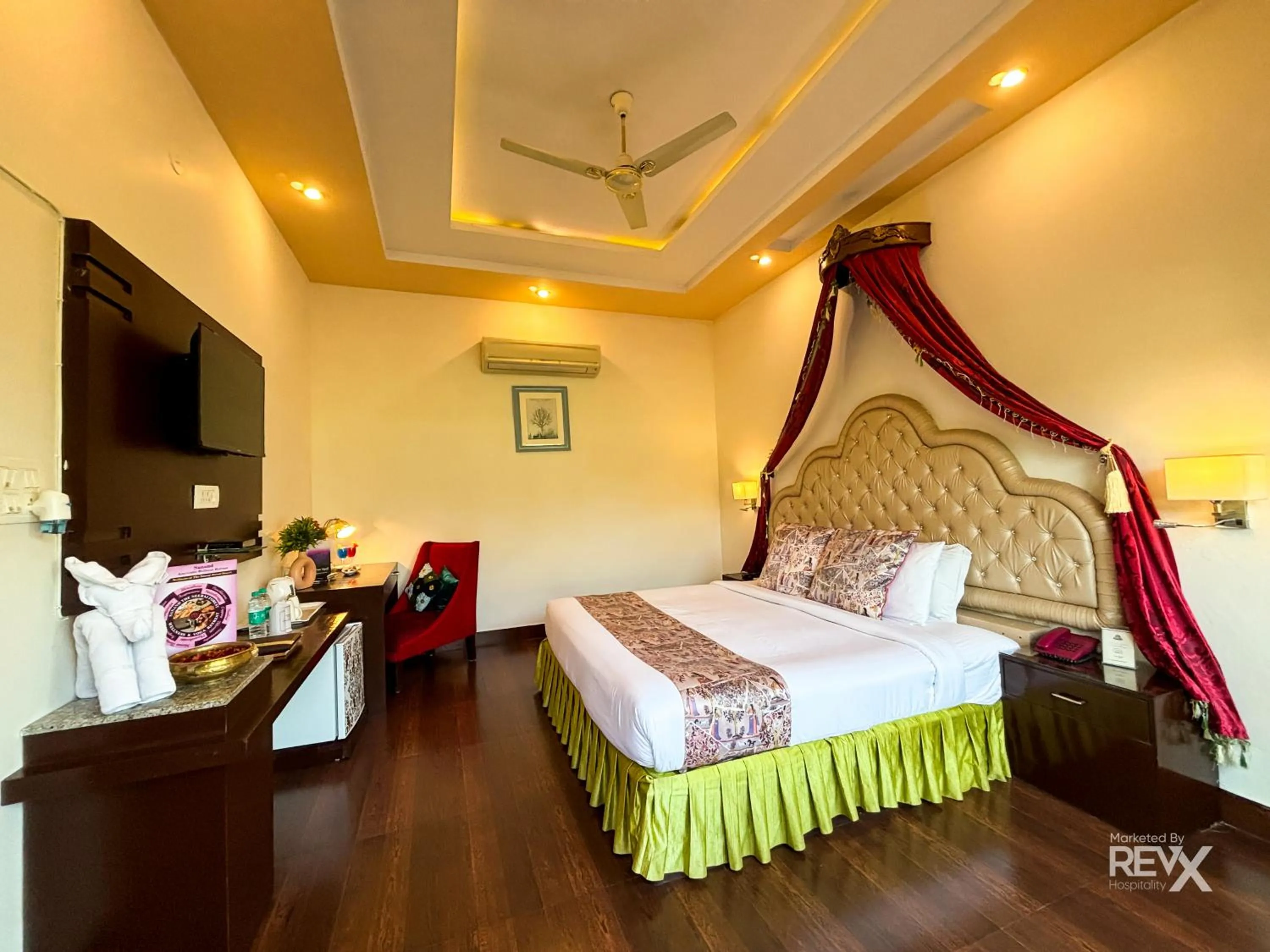 Bed in The Neeraj River Forest Resort Ayurvedic Wellness Center