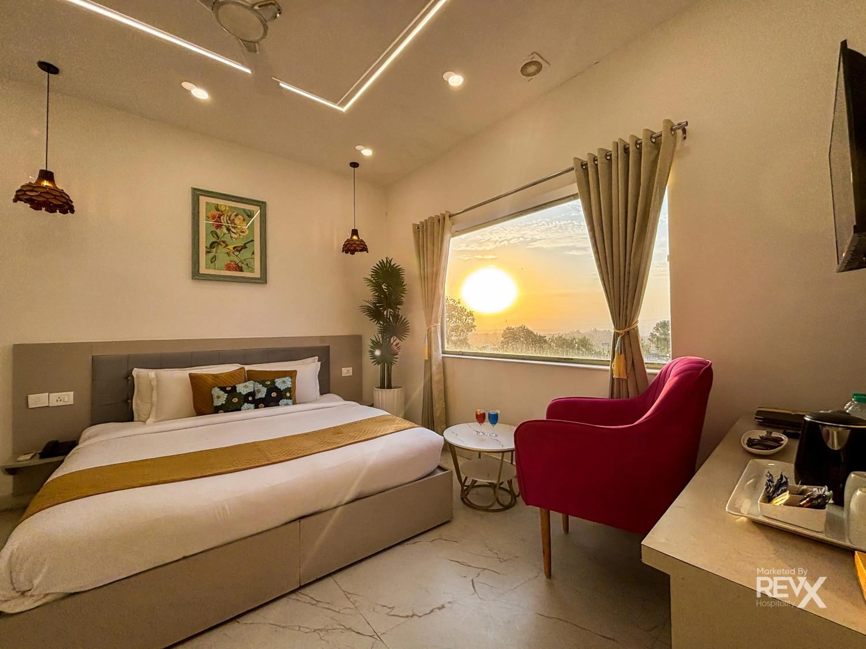 Bed in The Neeraj River Forest Resort Ayurvedic Wellness Center