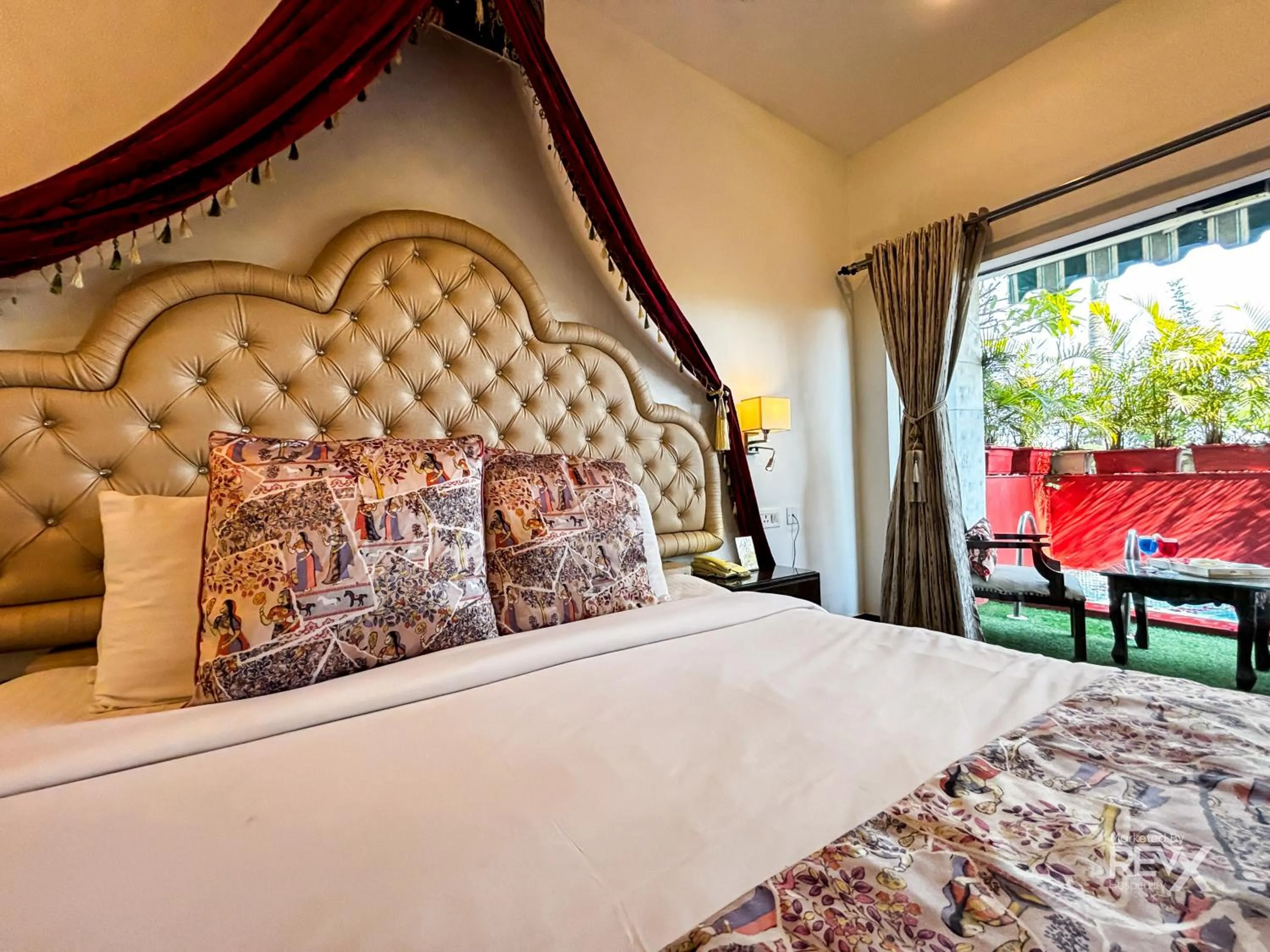 Bed in The Neeraj River Forest Resort Ayurvedic Wellness Center