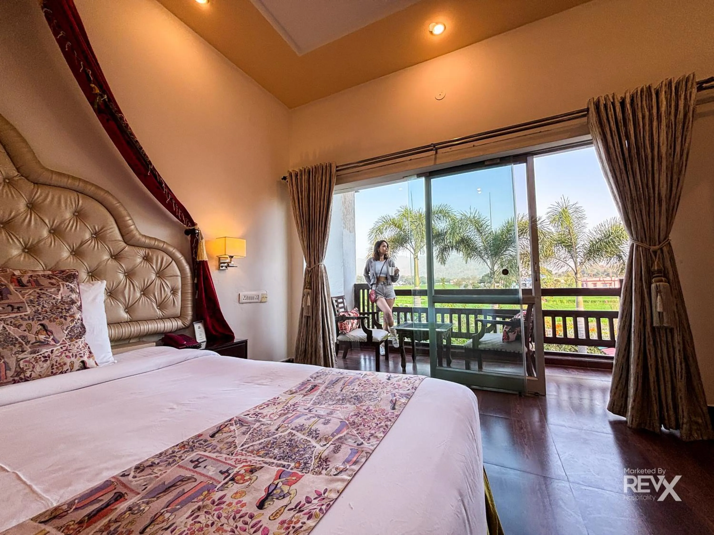 Bed in The Neeraj River Forest Resort Ayurvedic Wellness Center