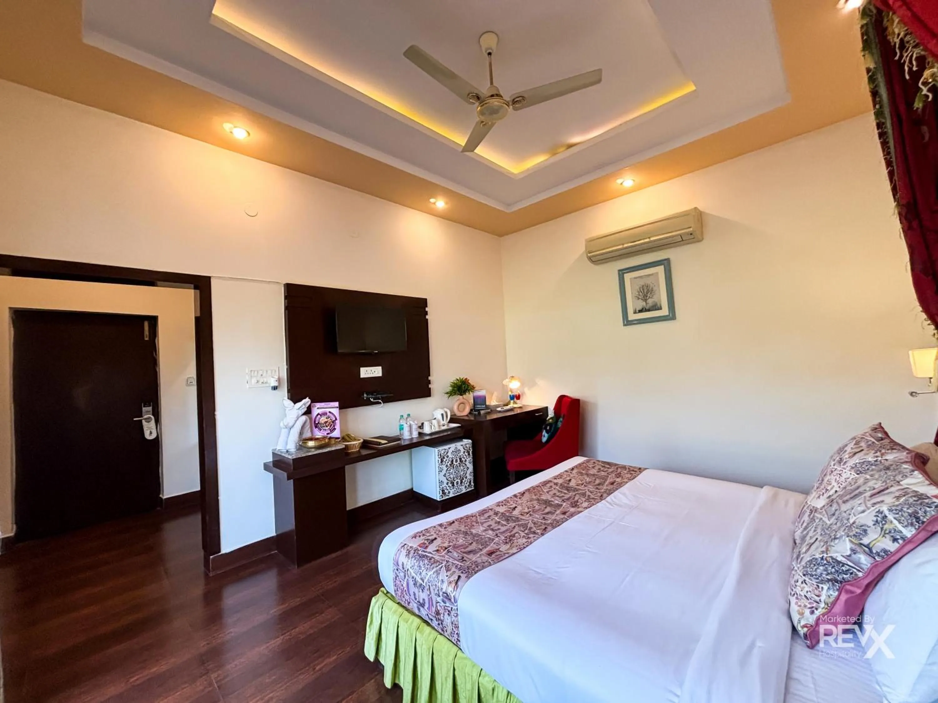 Bed in The Neeraj River Forest Resort Ayurvedic Wellness Center