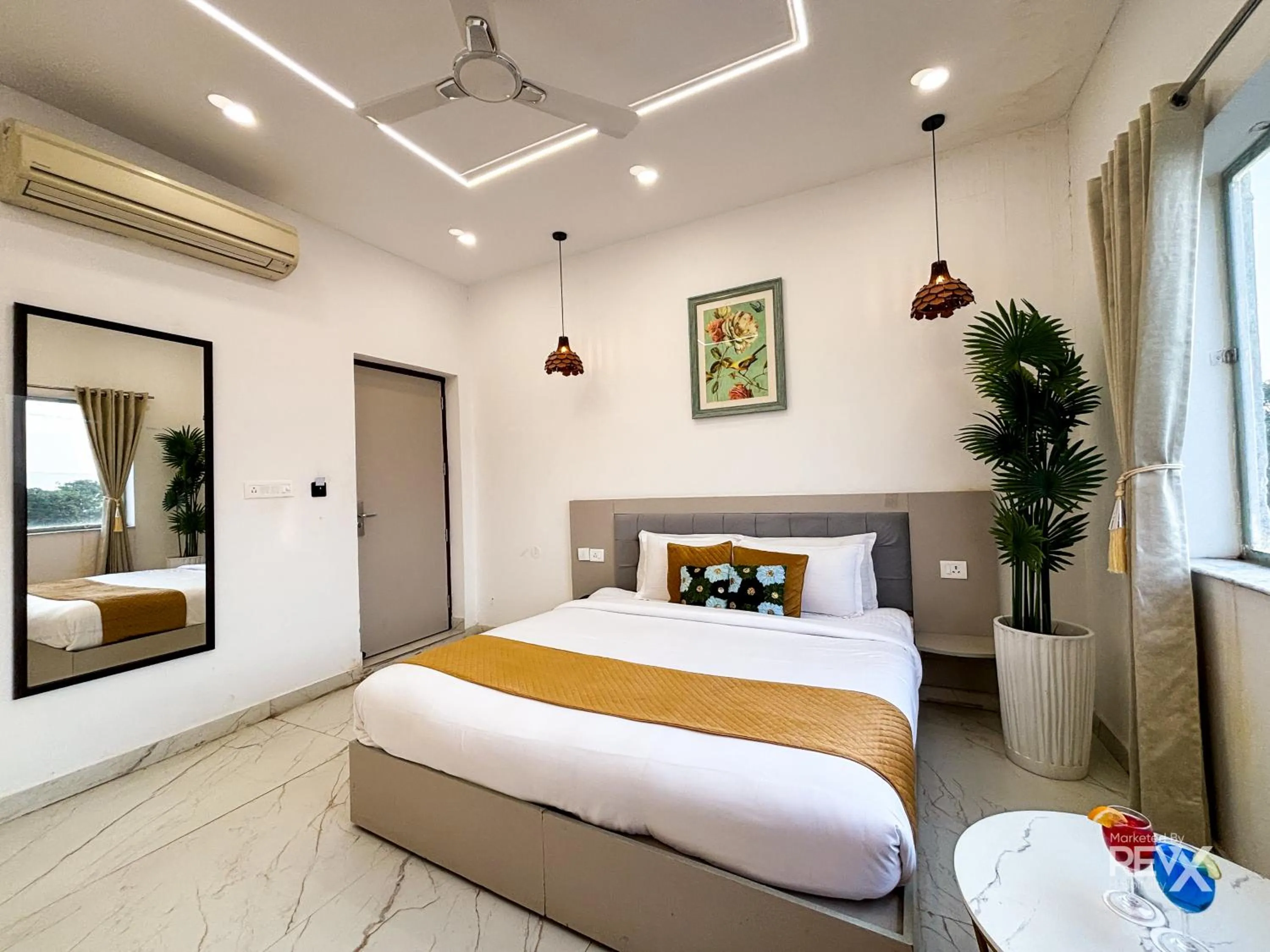 Bed in The Neeraj River Forest Resort Ayurvedic Wellness Center