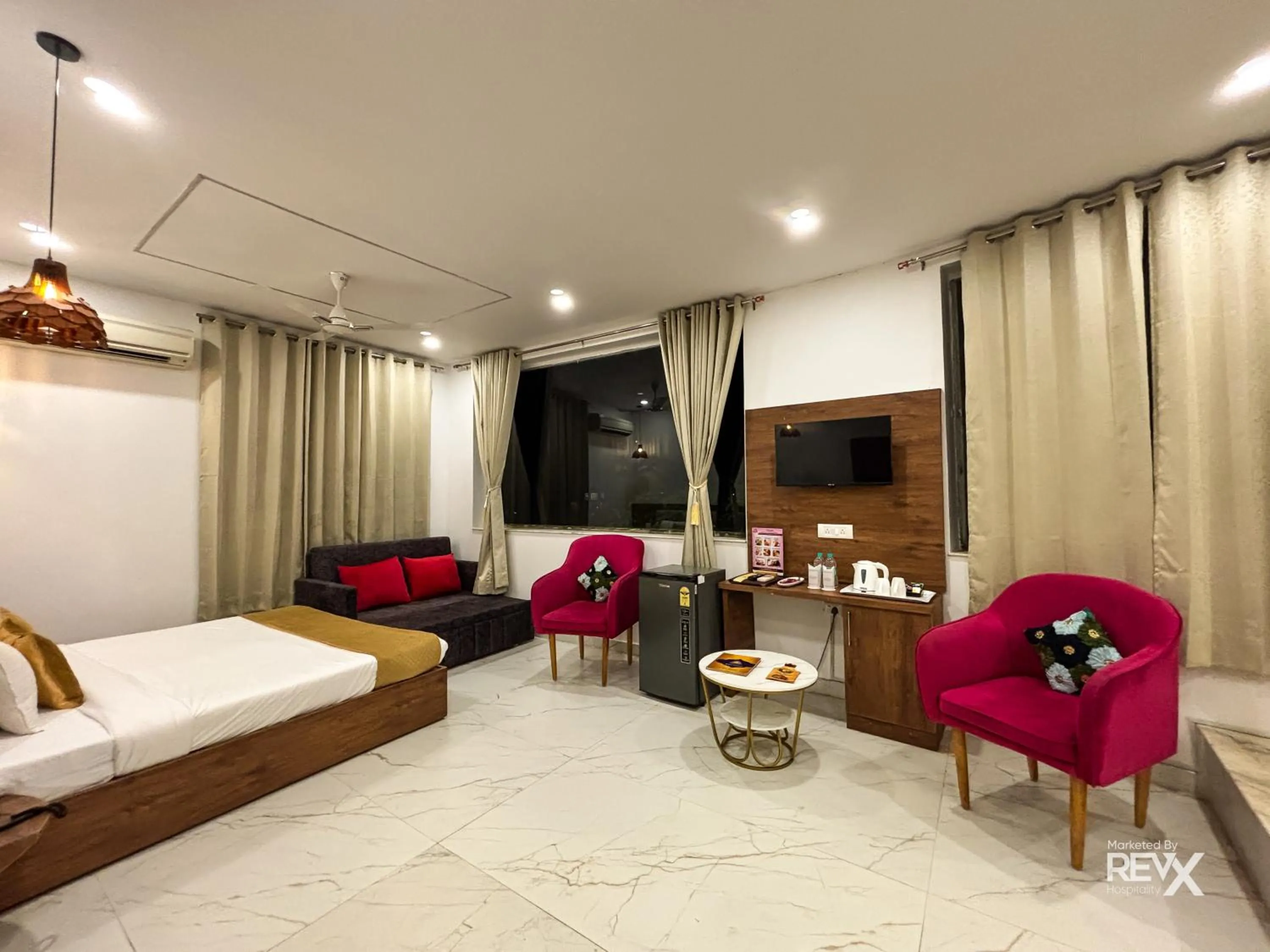 Bed in The Neeraj River Forest Resort Ayurvedic Wellness Center