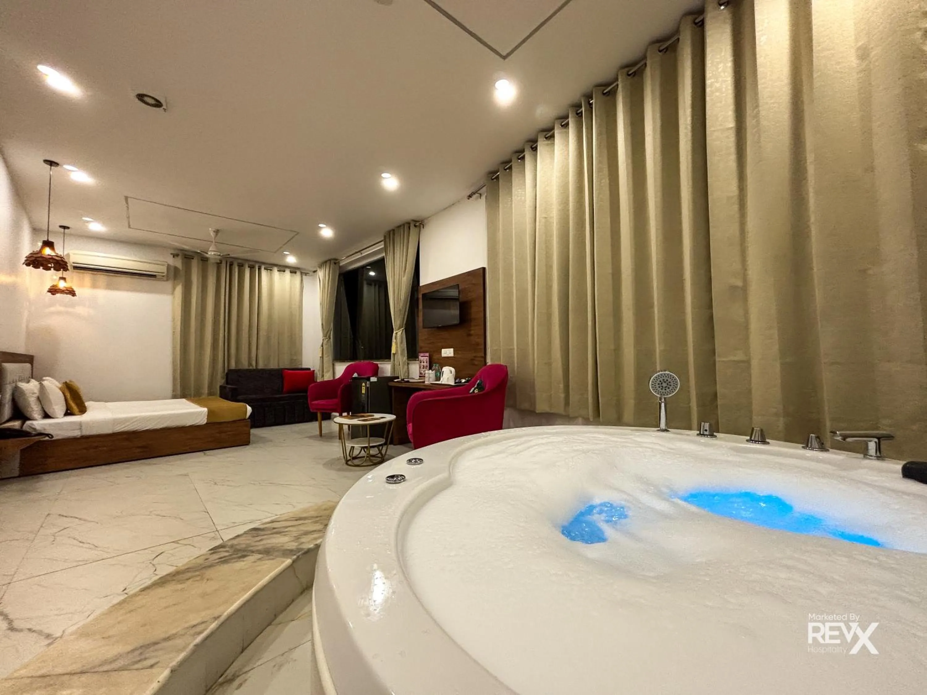 Bed in The Neeraj River Forest Resort Ayurvedic Wellness Center