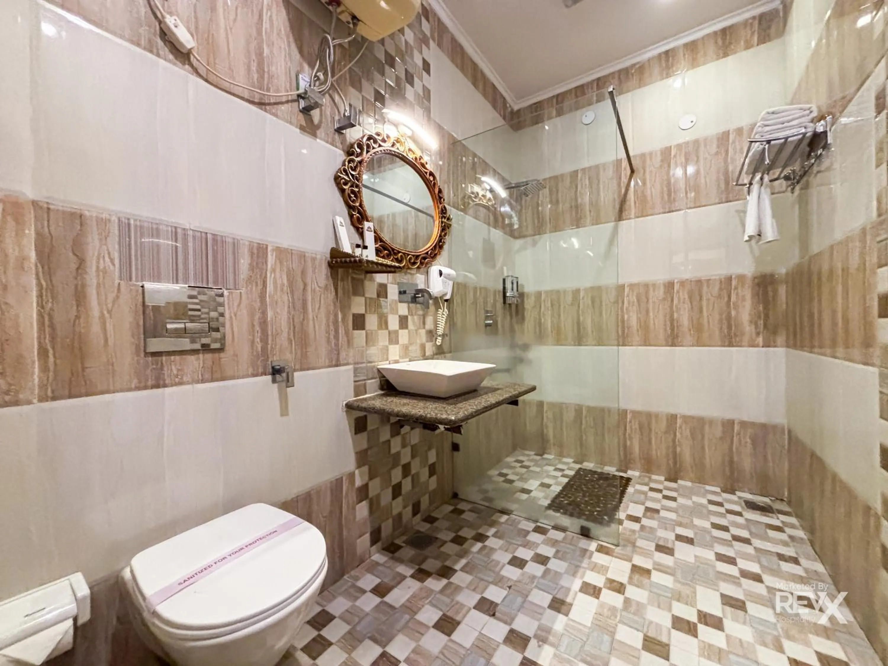 Bathroom in The Neeraj River Forest Resort Ayurvedic Wellness Center