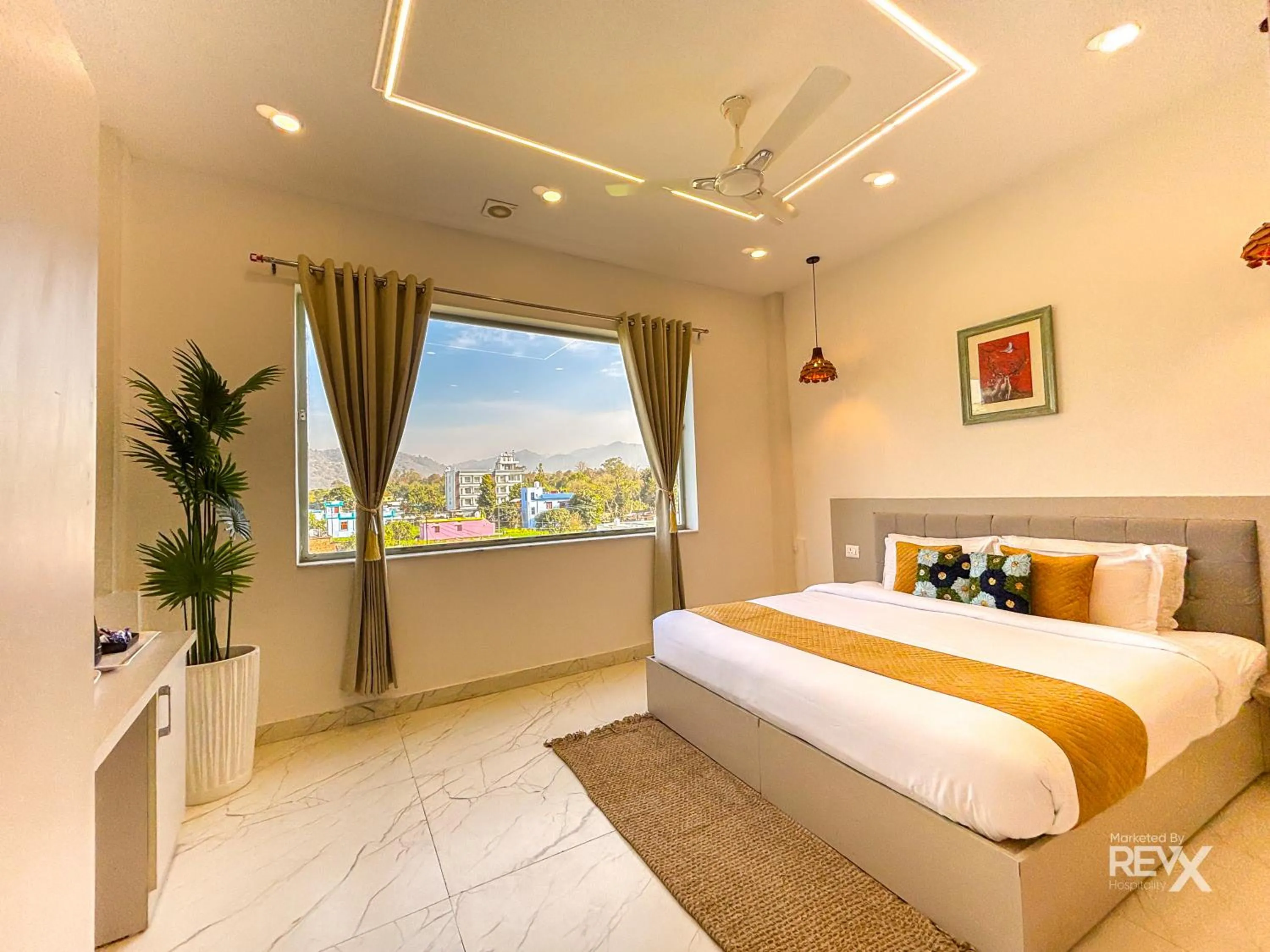 Bed in The Neeraj River Forest Resort Ayurvedic Wellness Center