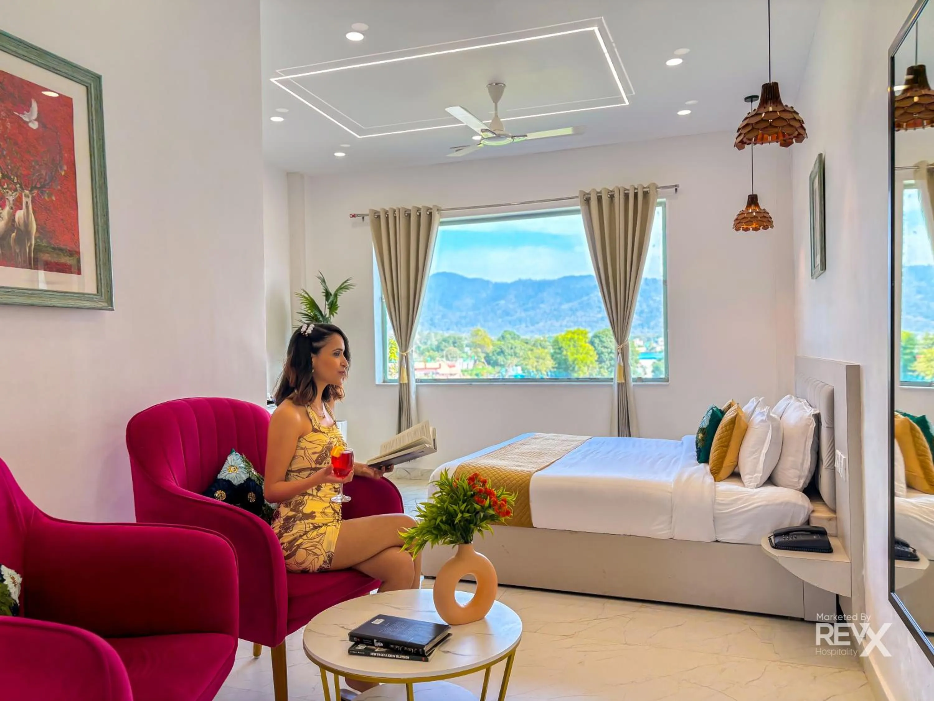 Bed in The Neeraj River Forest Resort Ayurvedic Wellness Center