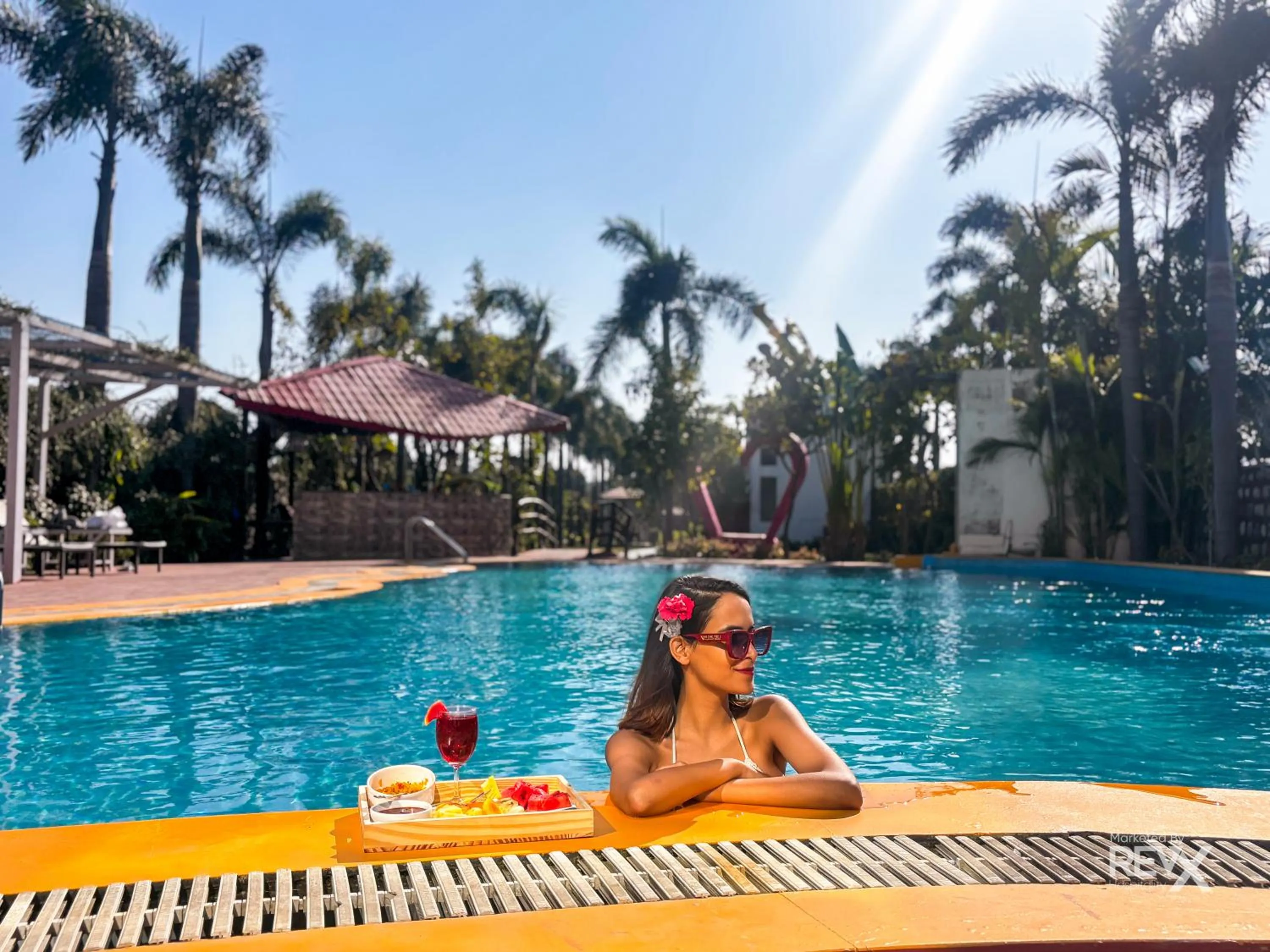 Swimming pool in The Neeraj River Forest Resort Ayurvedic Wellness Center