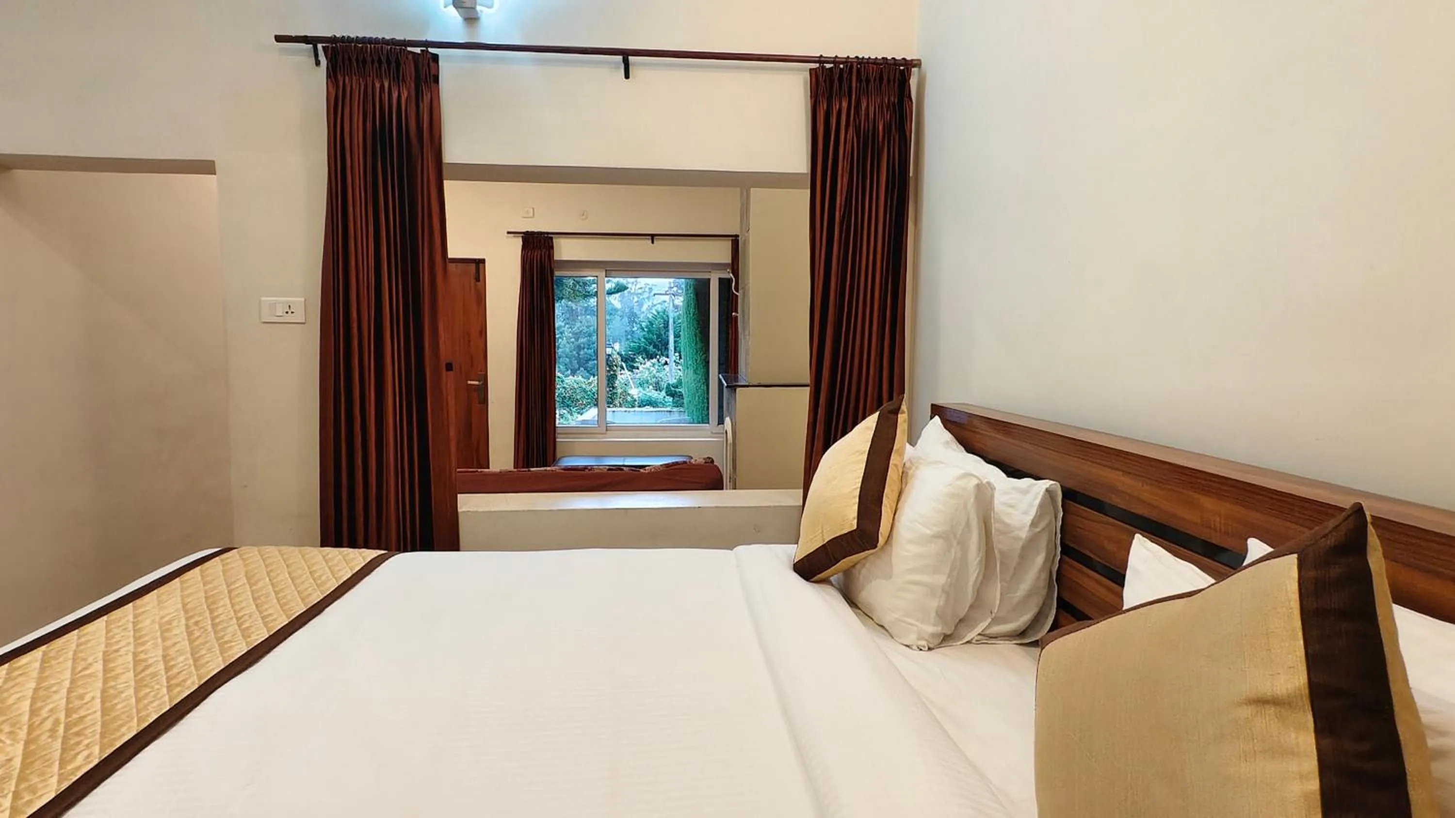 Bed in Yantra Resort, Ooty