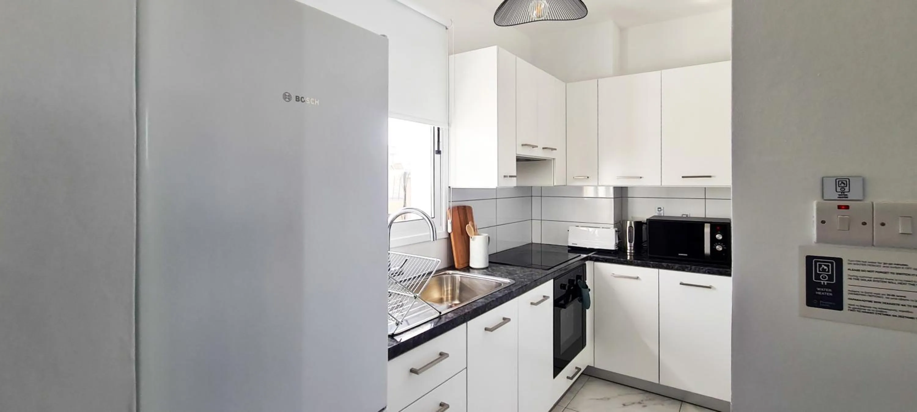 Kitchen or kitchenette in Phaedrus Living - Seaside Executive Flat Harbour 206