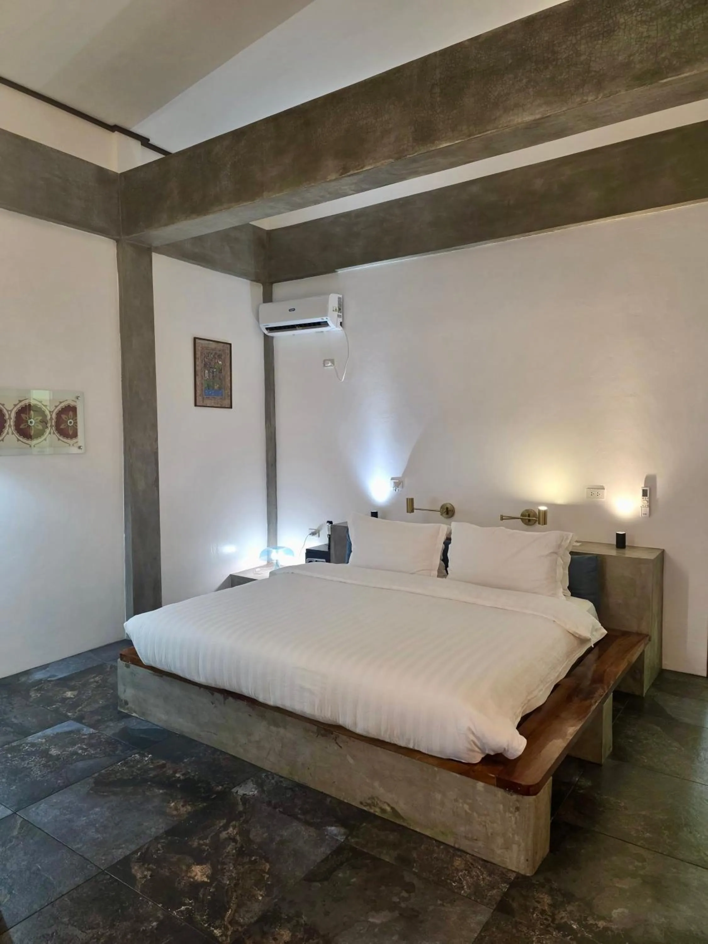 Bed in SomeWhere Else Boutique Resort