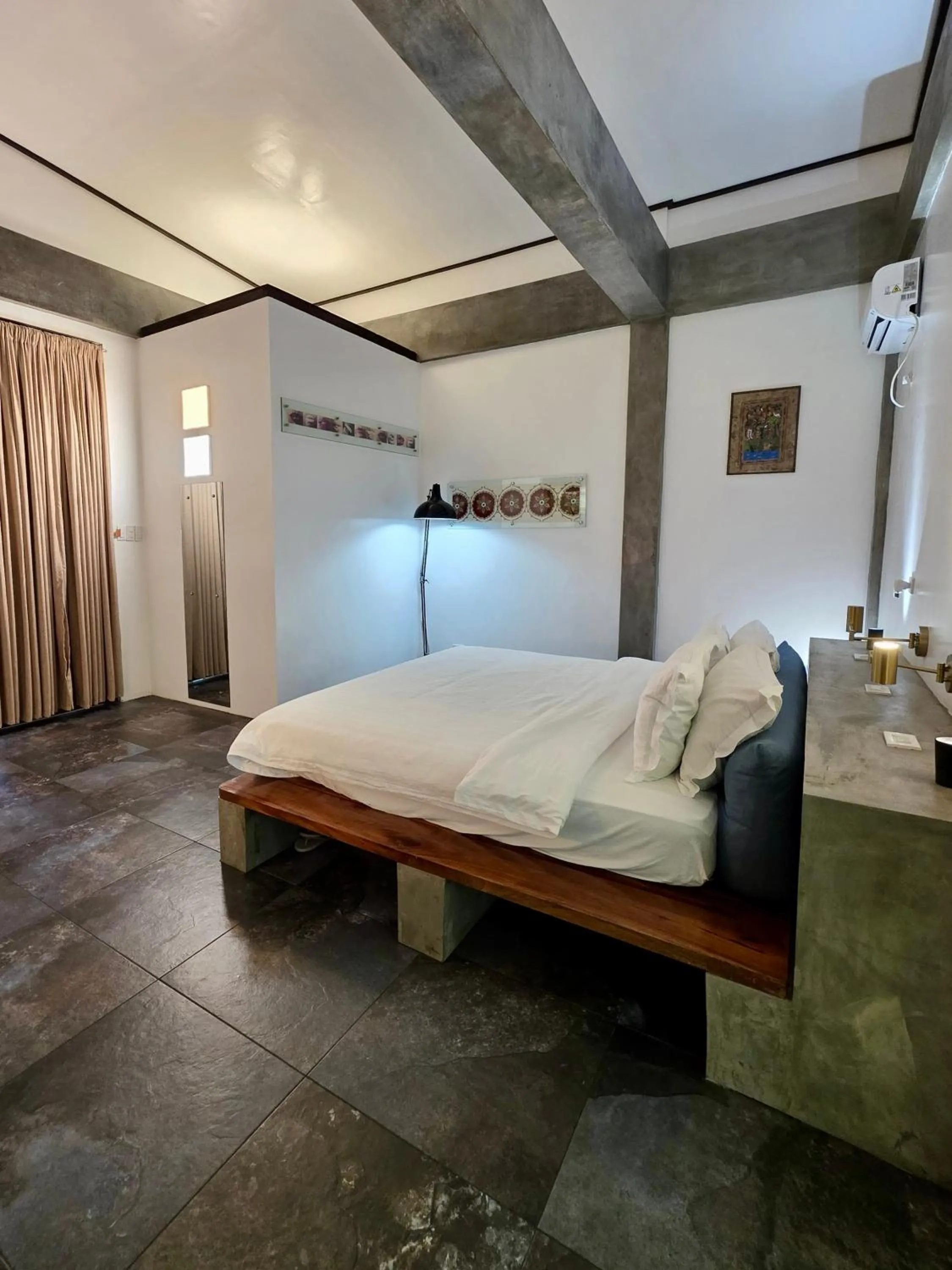 Bed in SomeWhere Else Boutique Resort