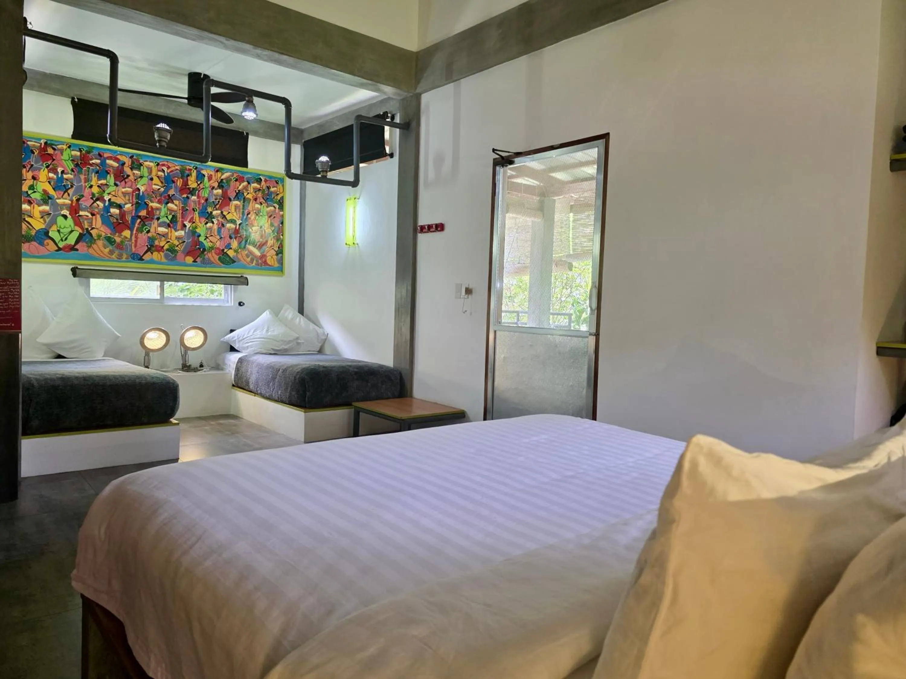 Bed in SomeWhere Else Boutique Resort