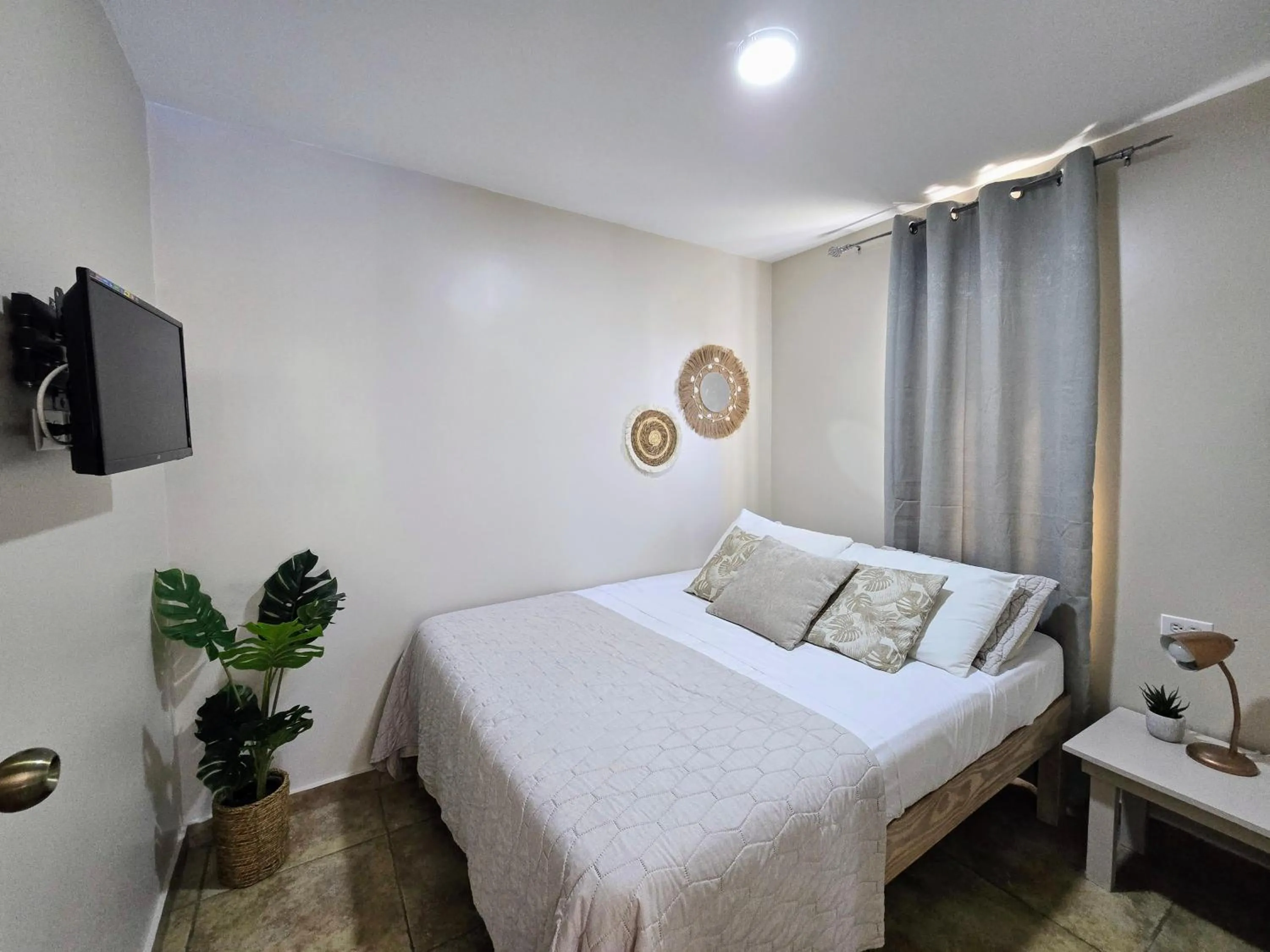 TV and multimedia, Bed in Rooi Santo Residence