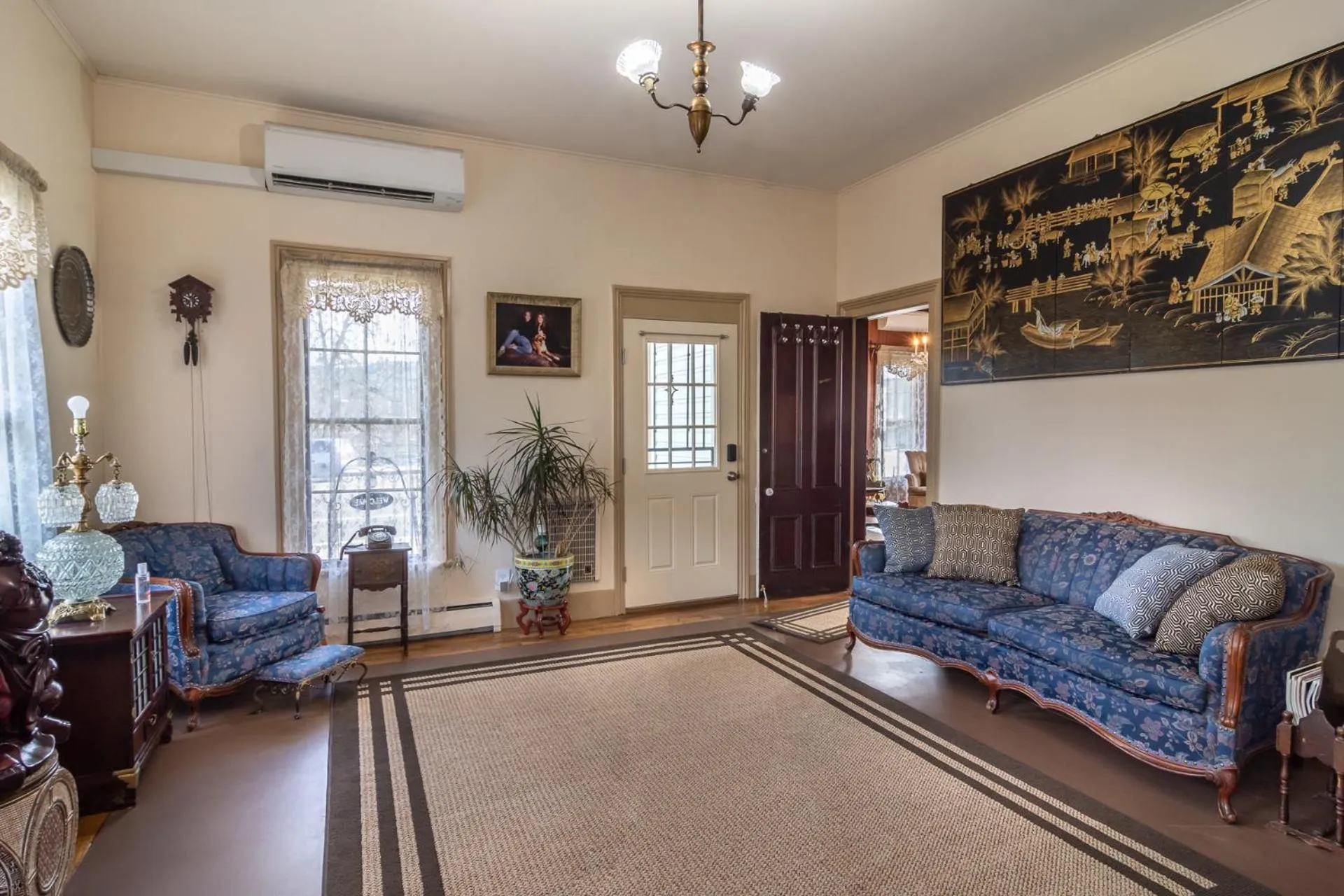 Living room in HISTORICAL JOHN RAST HOUSE circa 1875